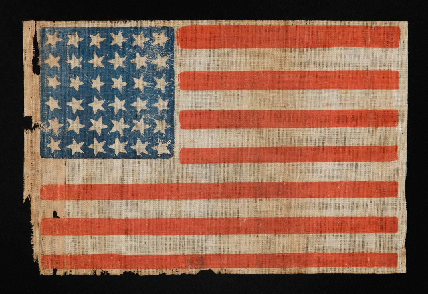 CIVIL WAR ERA ANTIQUE AMERICAN PARADE FLAG WITH 36 STARS IN DANCING ROWS, 1864-1867, REFLECTS NEVADA'S ADDITION AS THE 36TH STATE:

36 Star, Civil War era (1864-67) American parade flag, printed on coarse, glazed cotton. The stars are arranged in 6