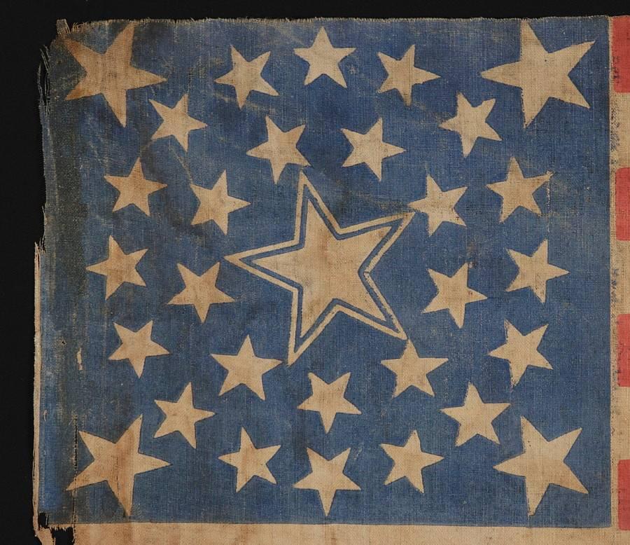 30 STARS, PRE-CIVIL WAR, RARE AND BEAUTIFUL WITH A MEDALLION CONFIGURATION THAT FEATURES A HALOED CENTER STAR, WISCONSIN STATEHOOD, 1848-1850:

 30 star American national parade flag, printed on coarse cotton, with a beautiful form of the
