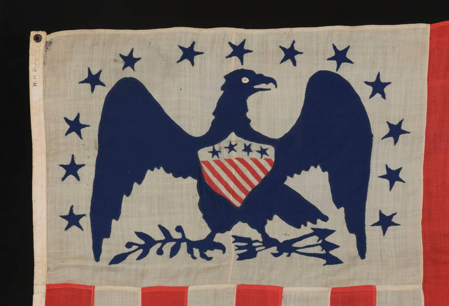 AMERICAN REVENUE CUTTER SERVICE ENSIGN BELONGING TO CAPTAIN WILLIAM HENRY BAGLEY (b. 1838, DURHAM, MAINE), A RARE AND FANTASTICALLY VISUAL EXAMPLE, MADE CA 1870-80:

 United States Revenue Cutter Service ensign, made ca 1870, with a canton bearing