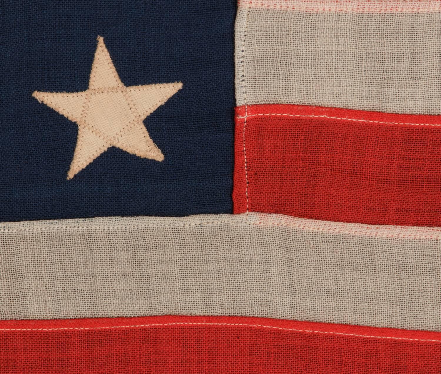 13 Stars Arranged in a 3-2-3-2-3 Pattern on a Small-Scale American Flag In Good Condition In York County, PA