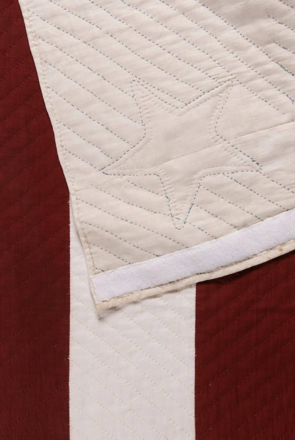 OUTSTANDING CIVIL WAR PATRIOTIC QUILT IN A DIAMOND-IN-A-SQUARE PATTERN SOURCED FROM PETERSON'S MAGAZINE, JULY 1861, MODIFIED BY THE MAKER TO INCLUDE 35 STARS AROUND THE PERIMETER AND A SOUTHERN-EXCLUSIONARY COUNT OF 20 STARS IN THE CENTER,