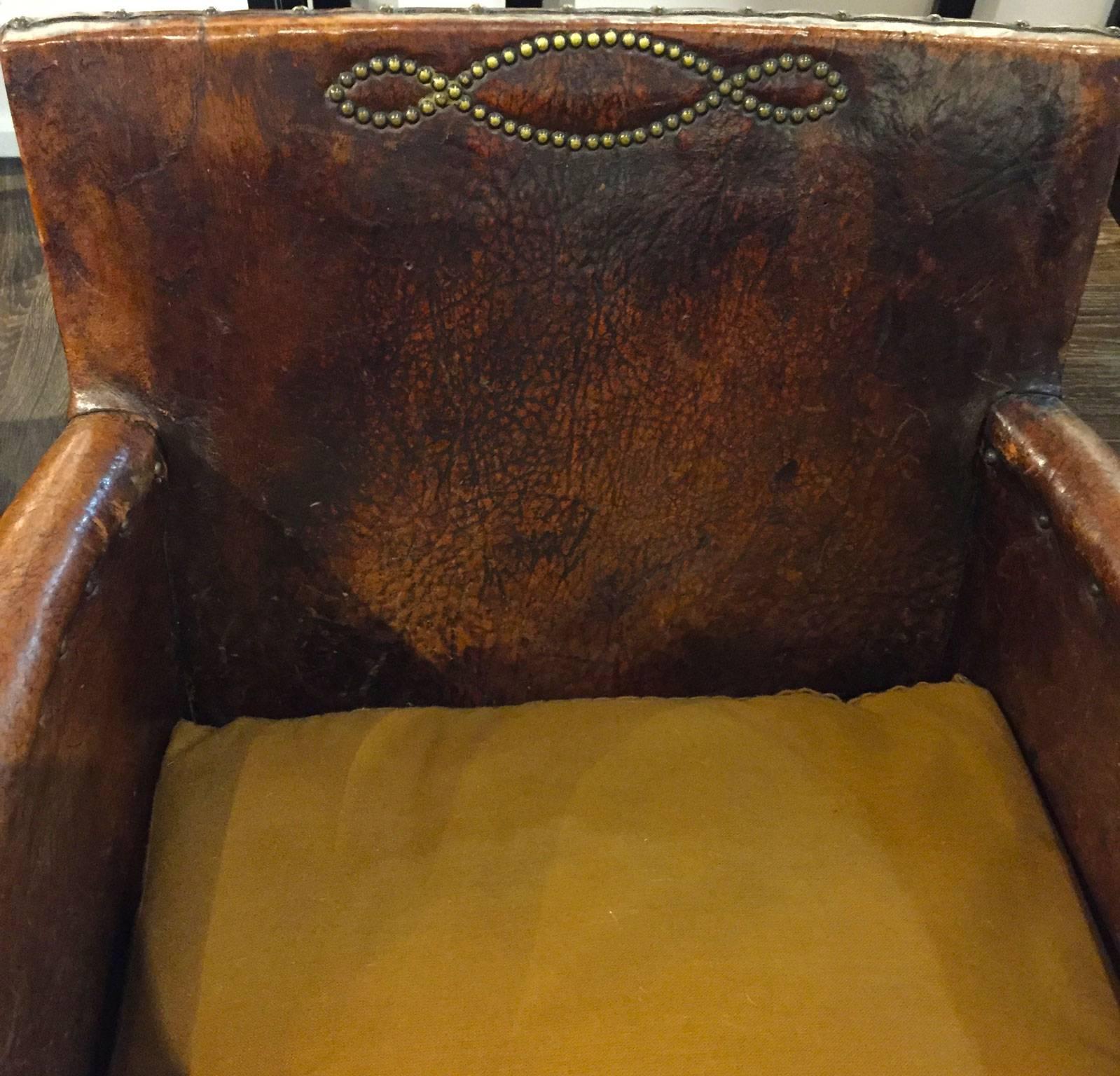 Pair of Leather Chairs, circa 1930 In Distressed Condition In San Francisco, CA