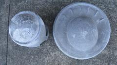 Pair of Stone Hat Froms