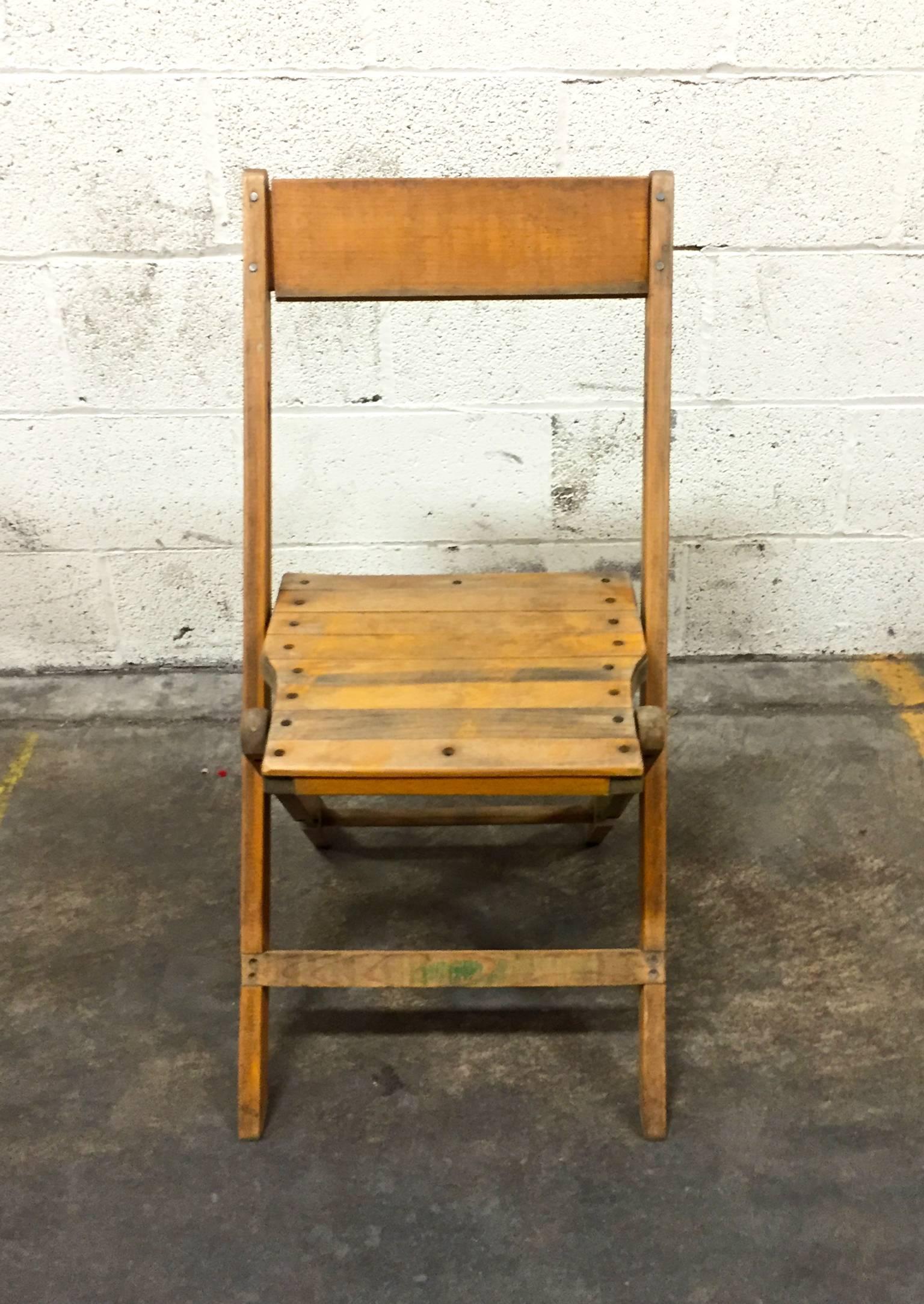 Charming vintage wood folding stadium seats are perfect for an event, or to use for extra seating. 

These chairs were made by the Snyder Chair Co. in Pennsylvania which later became the Palmer Snyder Furniture Co. The company produced this model