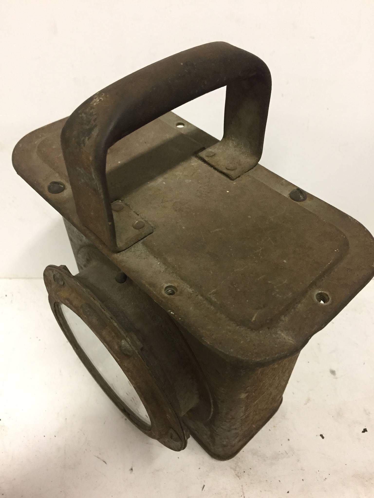 Vintage lantern, with metal handle. Decorative item for interesting setting, sure to add warmth and a cabin country feel.