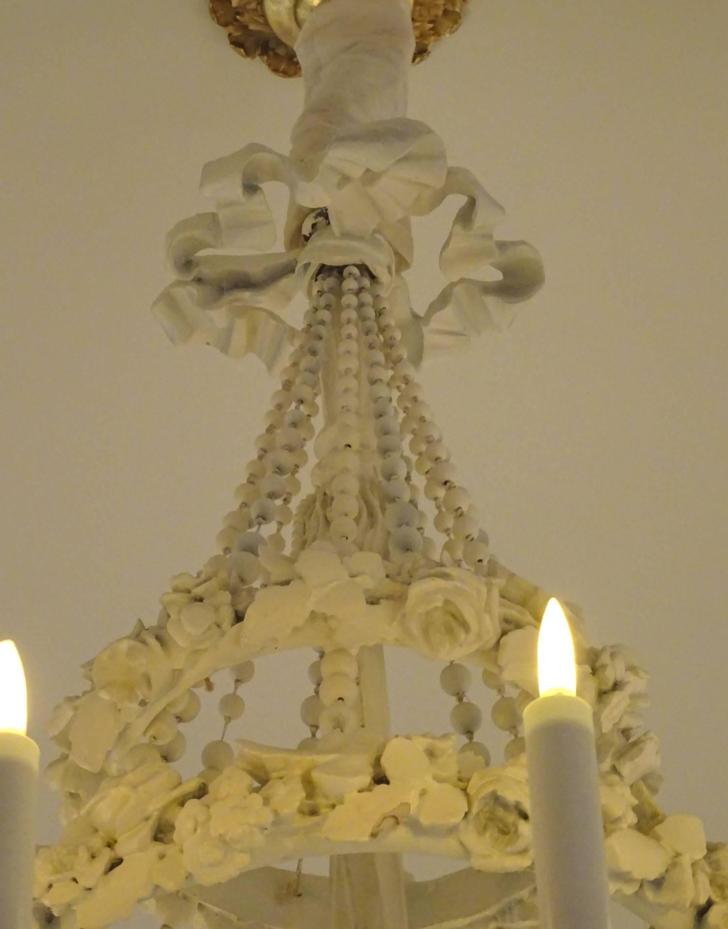 20th Century Ornately Carved Wooden Ten-Light Chandelier For Sale