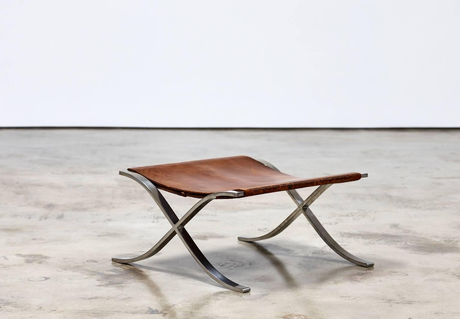 Barcelona stool by Ludwig Mies van der Rohe for Knoll,

USA, circa 1960s.

Stainless steel, original cognac leather.

Measures: 12 in. H x 23 in. W x 24 in. D.
30 cm H x 58 cm W x 61 cm D.
 