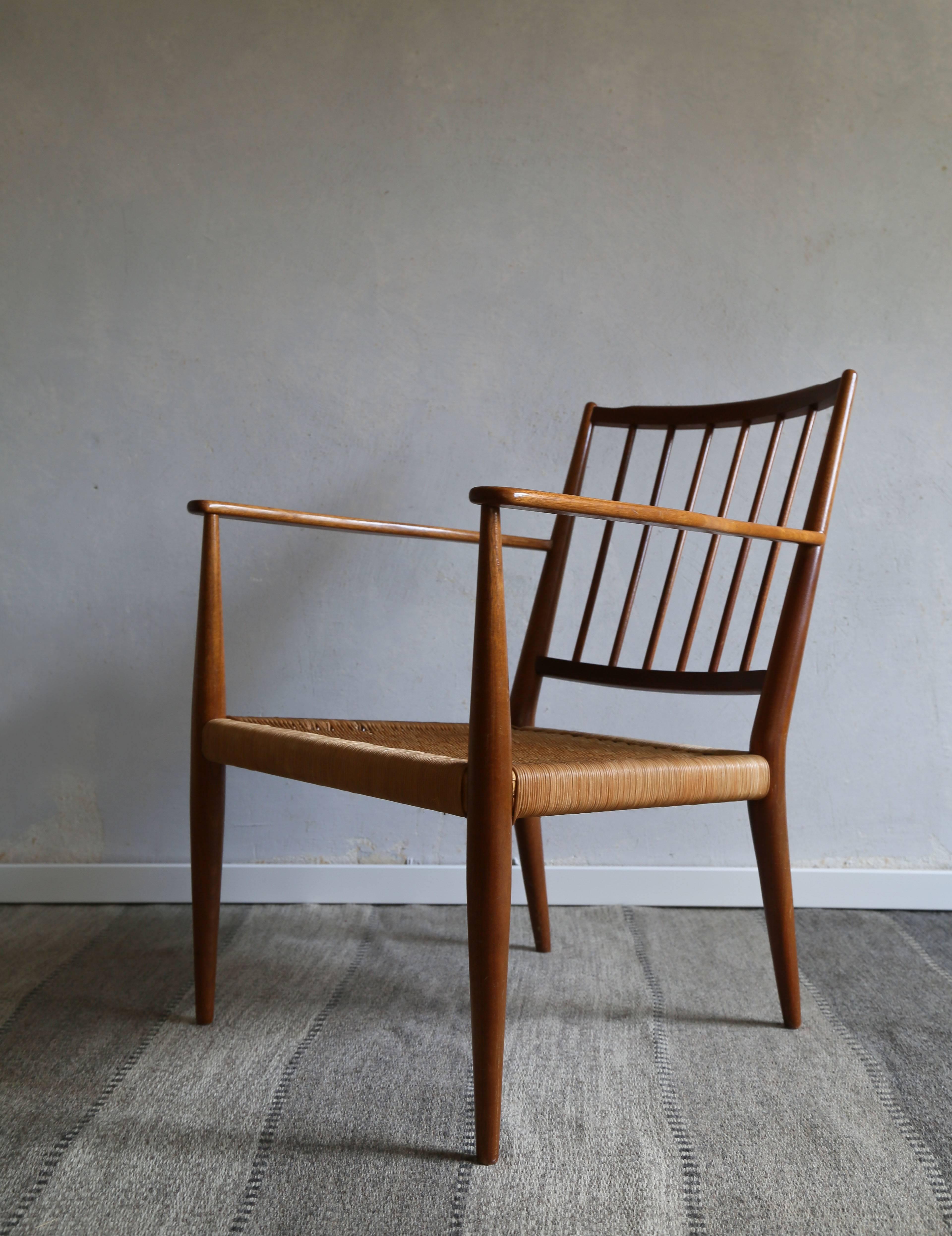 Armchair by Swedish/Austrian designer and architect Josef Frank, Model No.508.

Designed in 1932 and manufactured by Firma Svenskt Tenn, Sweden, circa 1950s.

Unusual model, last production 1960s. Material mahogany and wicker.

Good condition