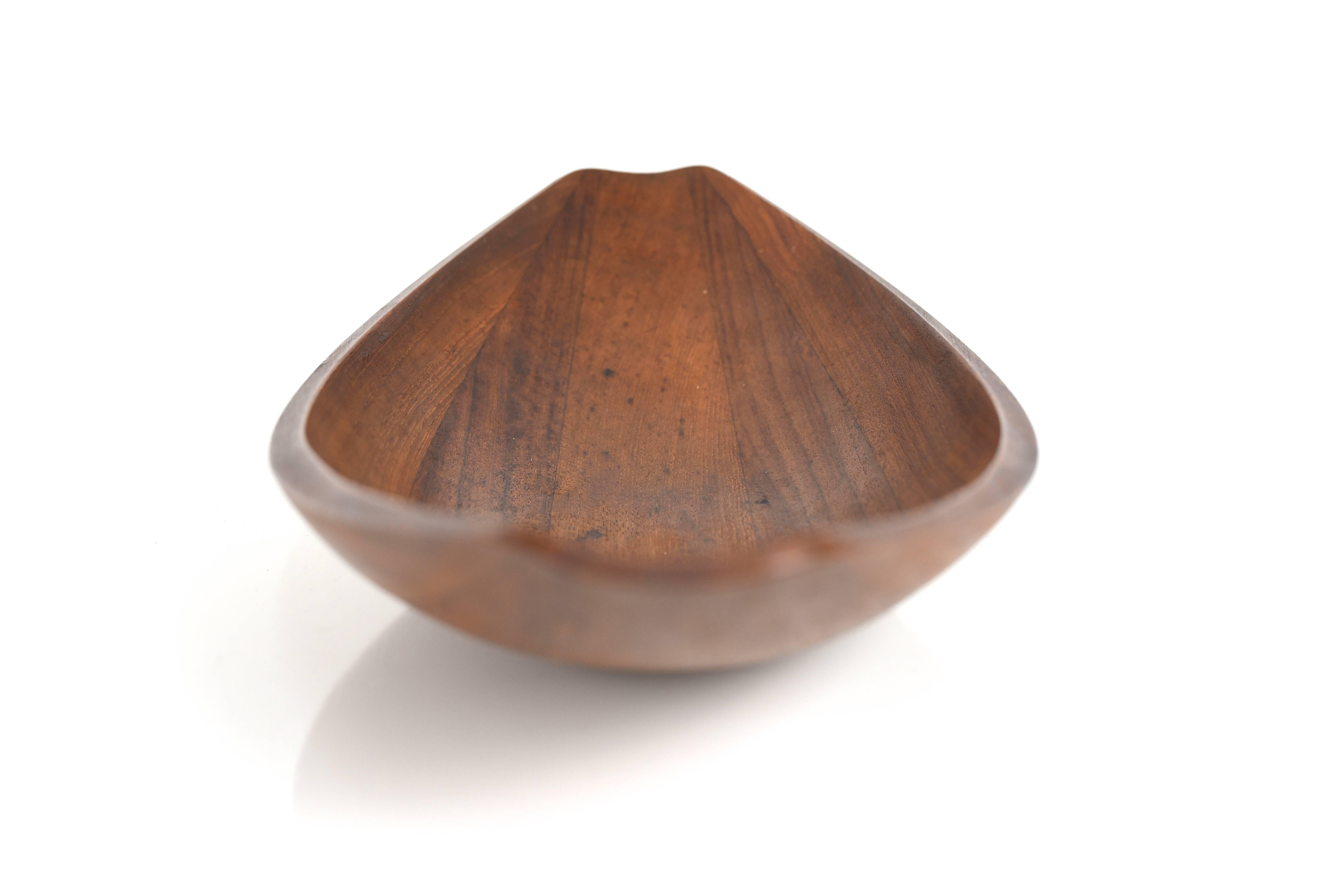 Jens H Quistgaard canoe bowl

By Dansk

Denmark, 1950s

Staved teak

First generation with early marking to underneath.
 