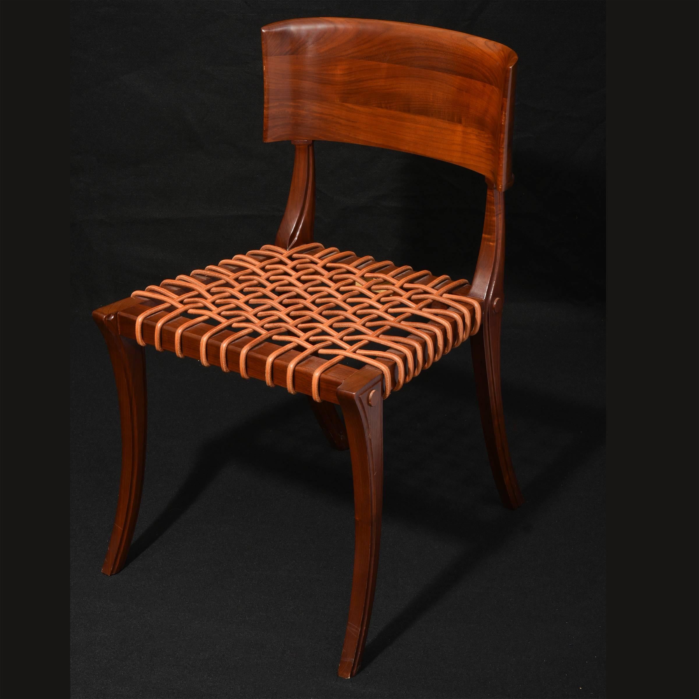 Klismos chair by T.H. Robsjohn-Gibbings

USA, circa 1990s.

Originally for Saridis of Athens, edition by Bexley Heath for John Widdicomb.

Walnut, original leather wrapped seat.

Measures: 35.5 H x 20 W x 28.5 D in.

Marked to underneath