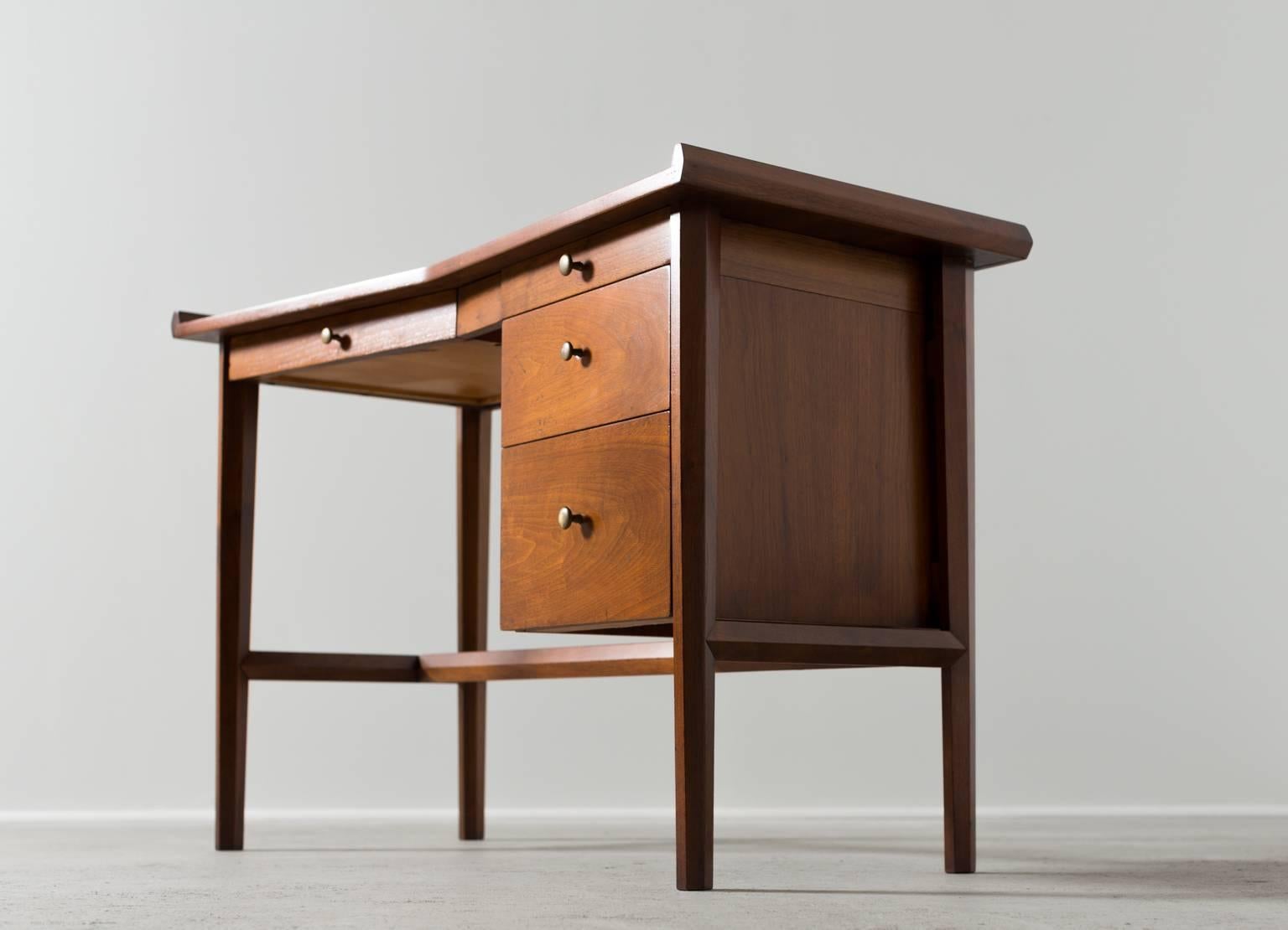 A desk by George Nakashima, Widdicomb Furniture Co. 

Origins collection five-drawer desk in walnut.
Model 3431,

USA, 1960.

Label shown interior of drawer.