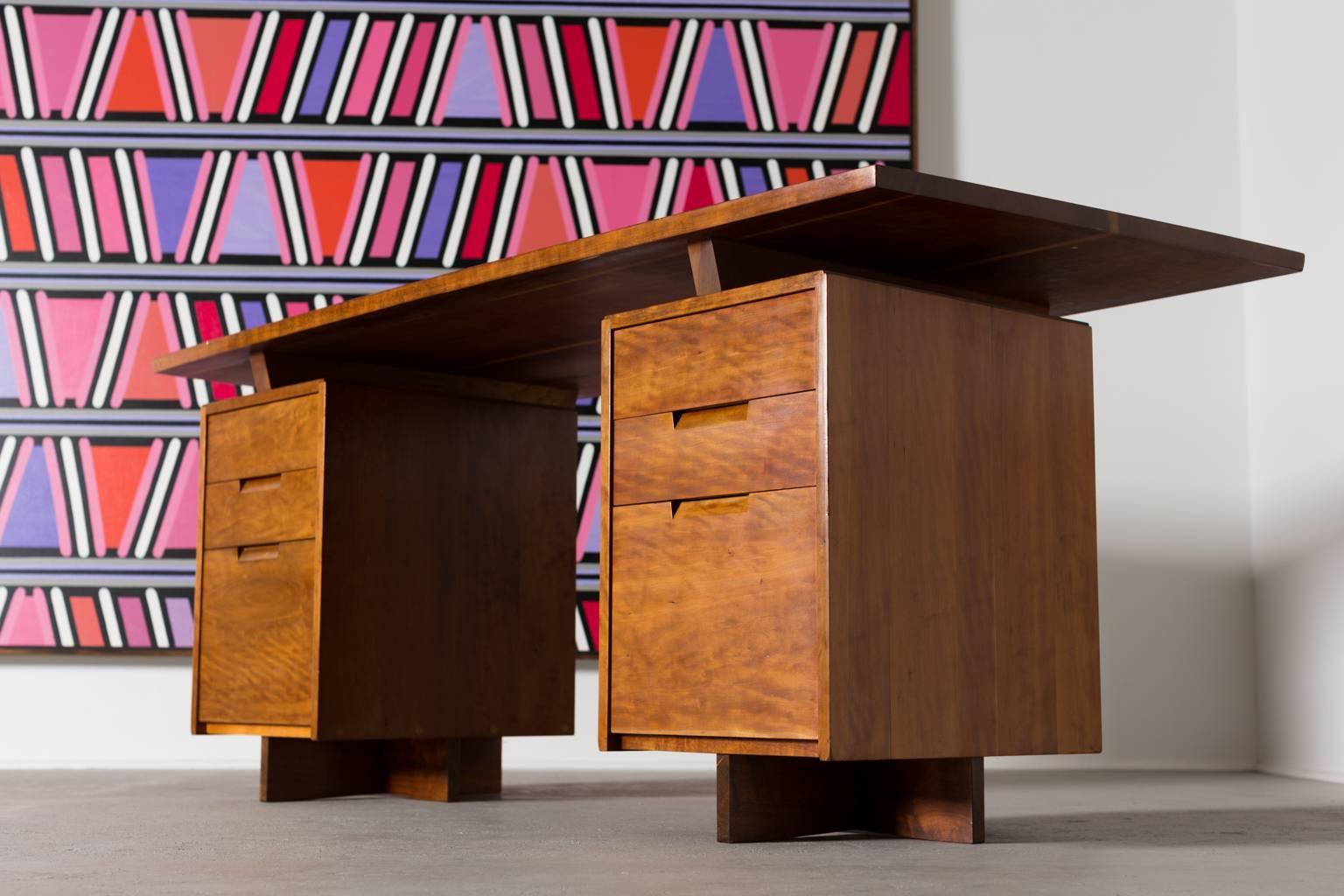 George Nakashima double pedestal desk in cherry.

George Nakashima Studios.
New Hope, PA USA, circa 1970s.

Measures: 28 x 72 x 30.5 inches.