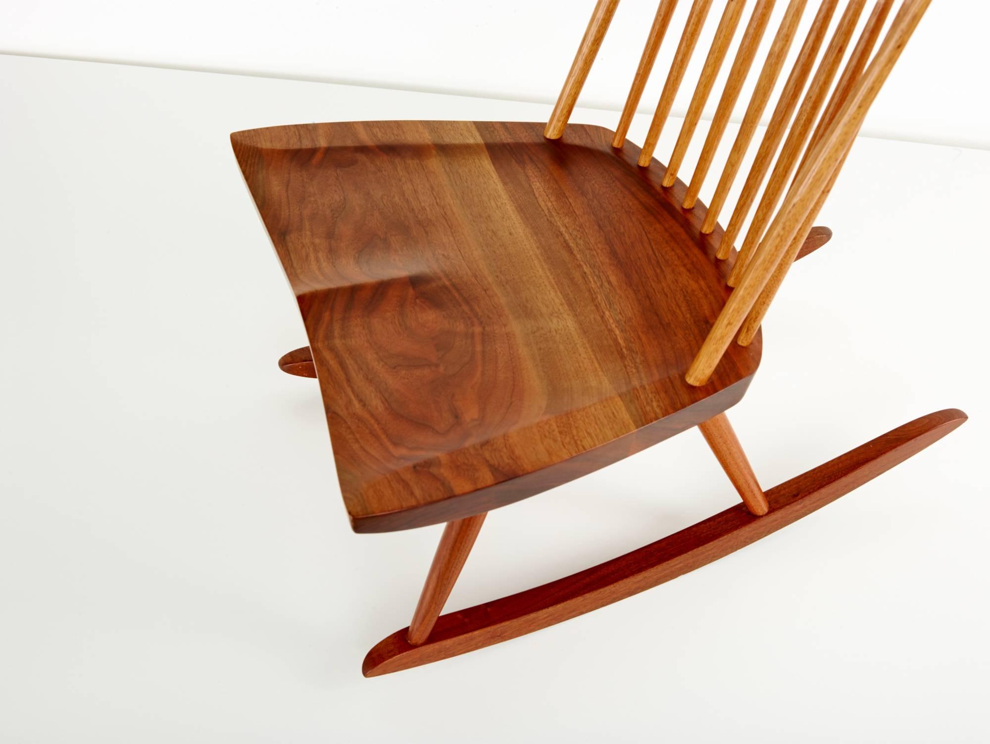 Rocking chair by George Nakashima.

USA, circa 1960.
Persian walnut, hickory.

Measures: 85.1 x 59.1 x 74.3 cm.

