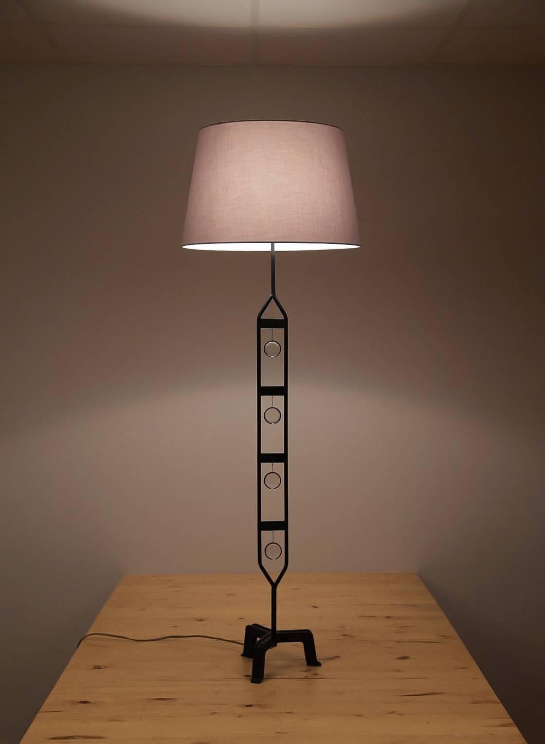 Rare floor lamp by Swedish designer and glass artist Erik Höglund. 

Sweden, late 1950s.
Boda Glasbruk (glass work) and Axel Strömberg Ironworks/Boda Smide (wrought iron)

Material wrought iron and mouth-blown glass, fabric shade. 

Measures: