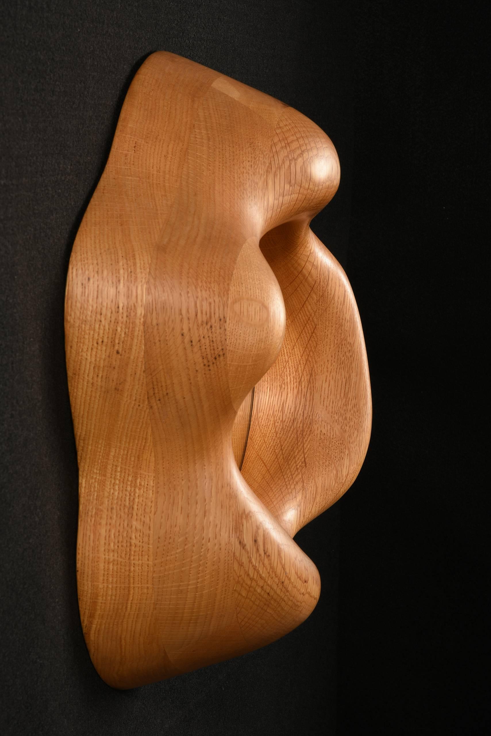 Rare stacked laminate mirror by Wendell Castle

USA, circa 1975

Oak

Signed with artist mark and 1975.19.18

Measures: 16 H x 16 W x 5.5 D in.