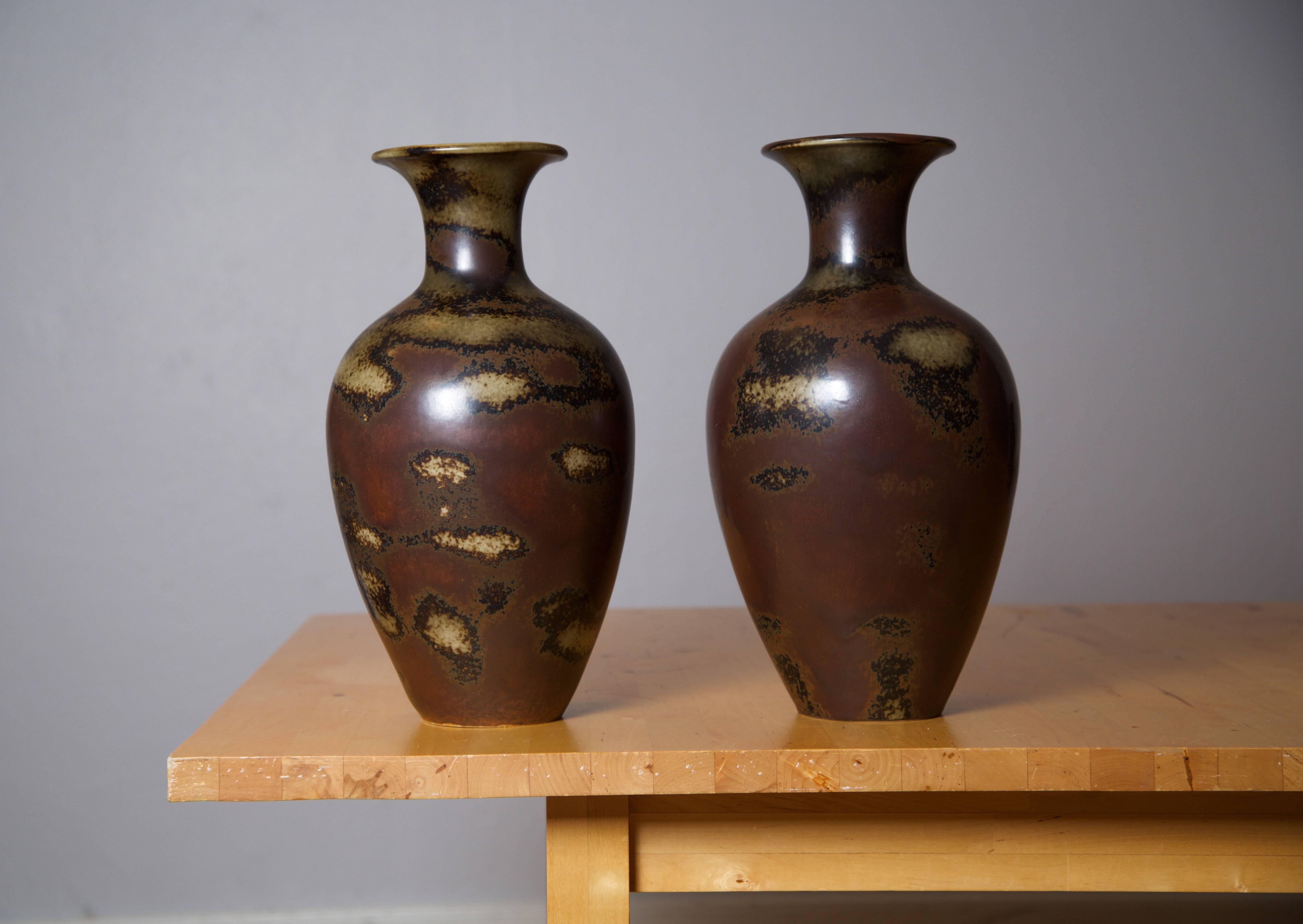 Pair of monumental floor vases by Swedish ceramist Gunnar Nylund. 

Handmade by Rörstrand Ab
Sweden, early 1950s

Stoneware with unusual and unique 