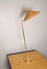 Paavo Tynell Floor Lamp with Wicker Shade and Stem, Idman Oy, Early 1950s