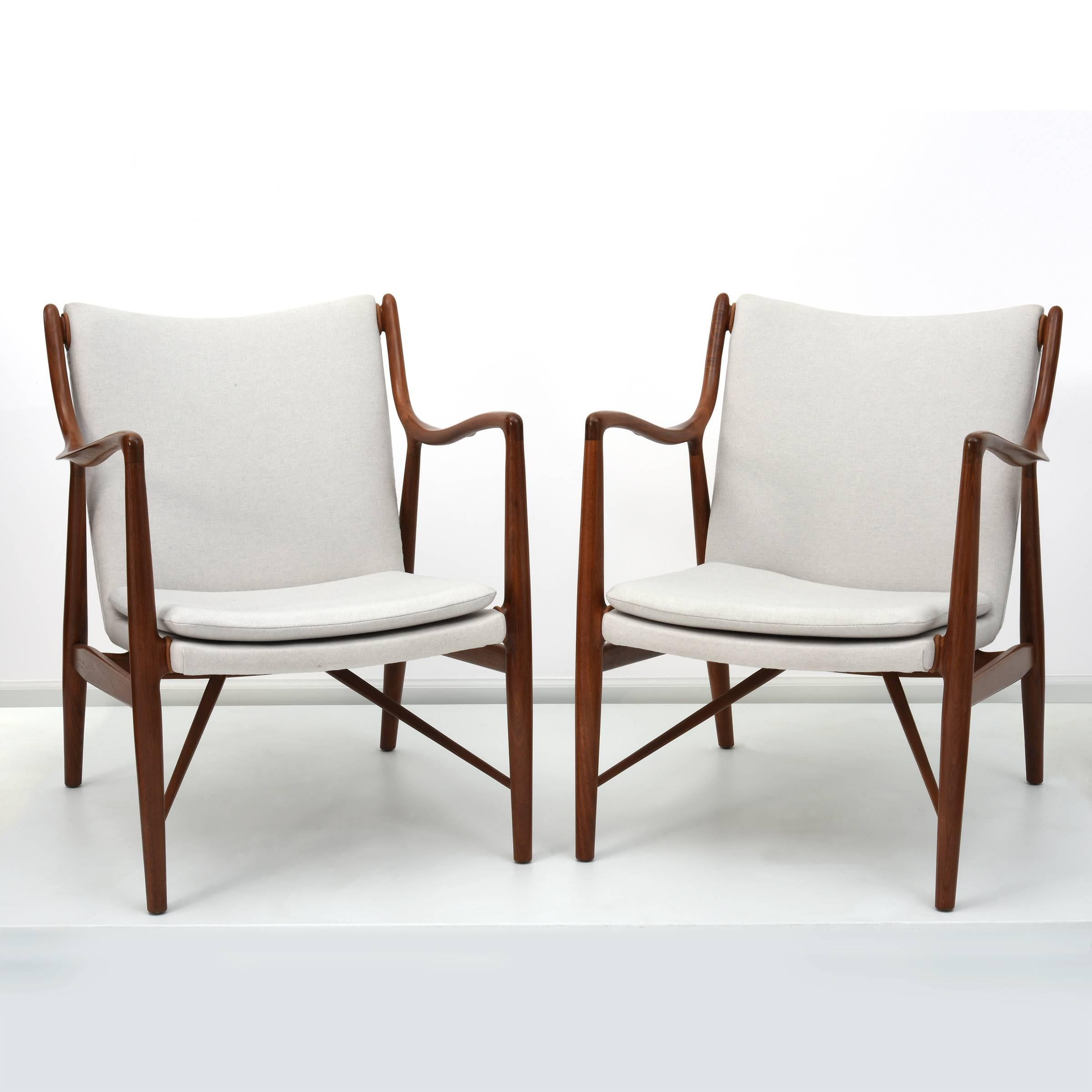 Matched pair of Finn Juhl Armchairs, Model FJ45

Denmark 1945 / USA, circa 1950s
Manufactured by Baker

Sculpted walnut, wool, leather

33 x 25 x 28.5 in
Seat: 18.5 in

Each frame marked.
Originally produced by Niels Vodder, Model NV45
