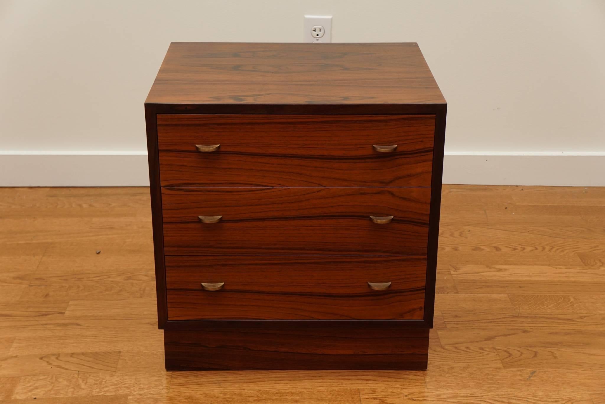 Sweet, three-drawer, rosewood dresser, designed by Thorbjørn Afdahl for Mellemstrands Traevare Industries of Norway.