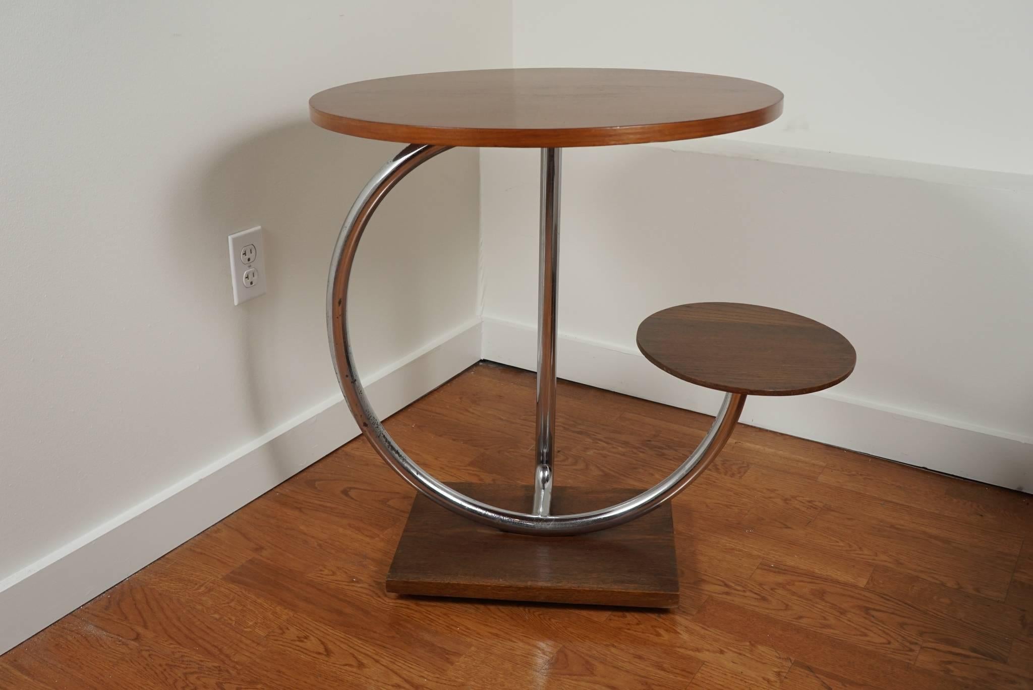 Super fun, and extremely unusual! Art Deco oak table with attached seat on a polished chrome frame.