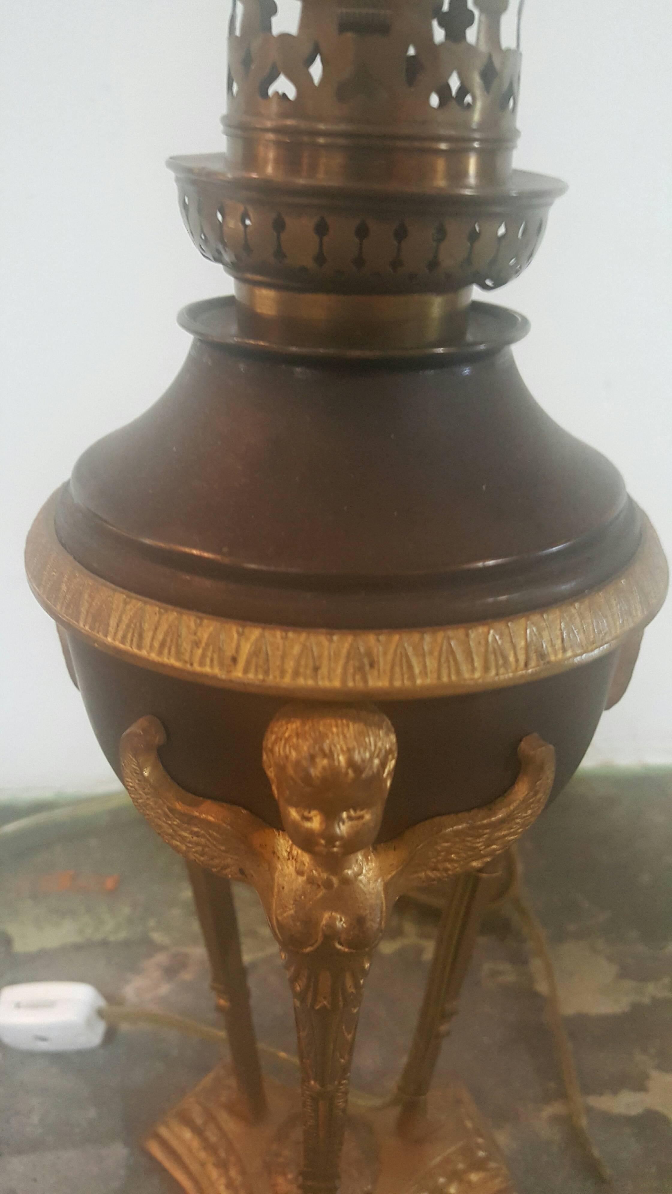 Doré bronze and metal French empire lamp.