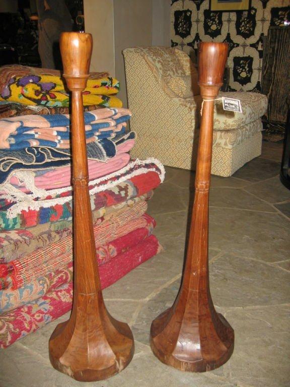 Vintage pair of Art Deco style Balinese candlesticks, hand-carved.
