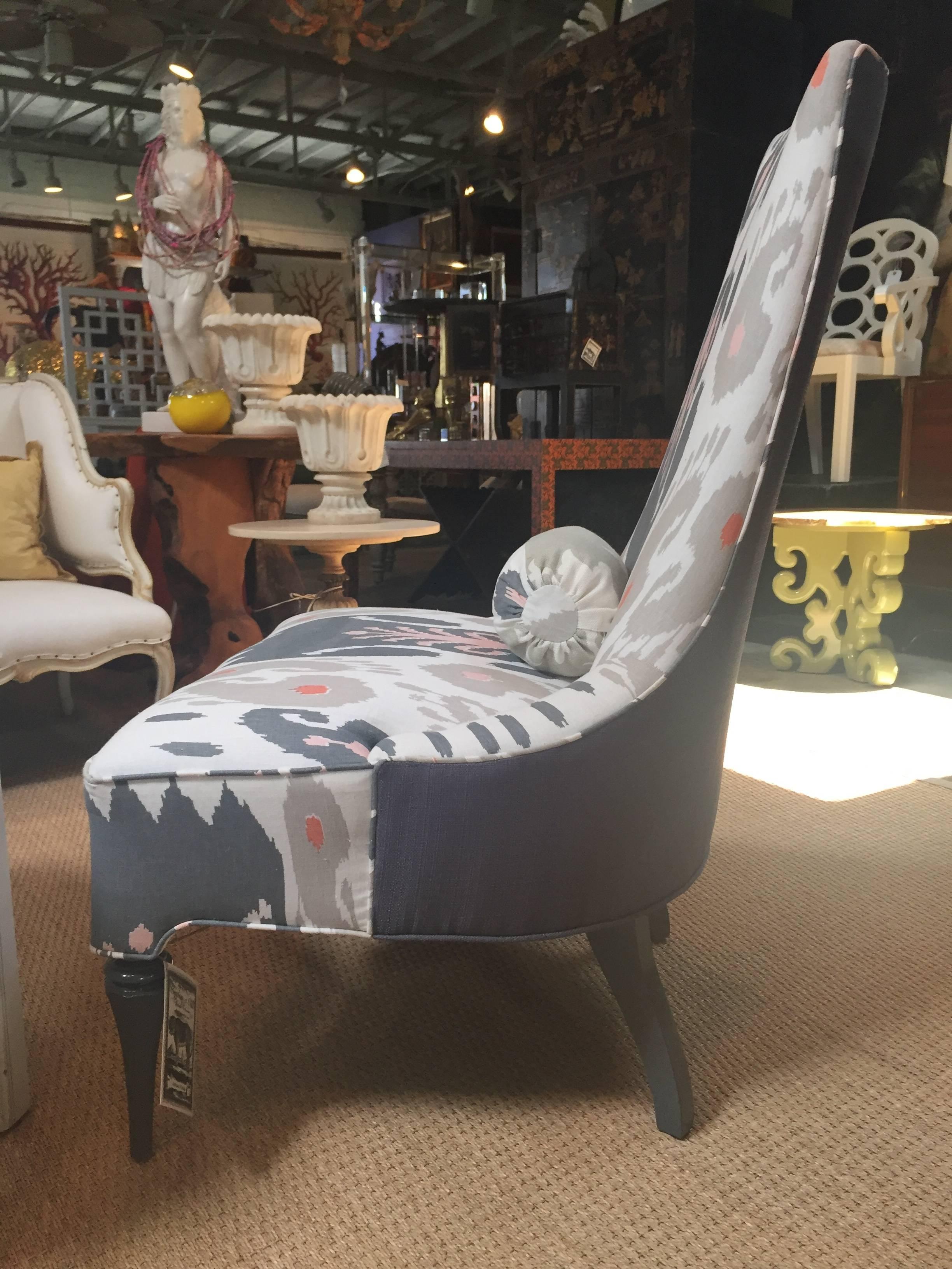 Lounge chair covered in Michelle Nussbaumer custom designed fabric

Outside back in contrasting linen

Finish on legs matches color in fabric

Tight seat and back make this a versatile chair for any conversation area. Armless design provides a
