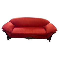 Early 20th Century English Victorian Style Red Upholstered Sofa with Wood Frame