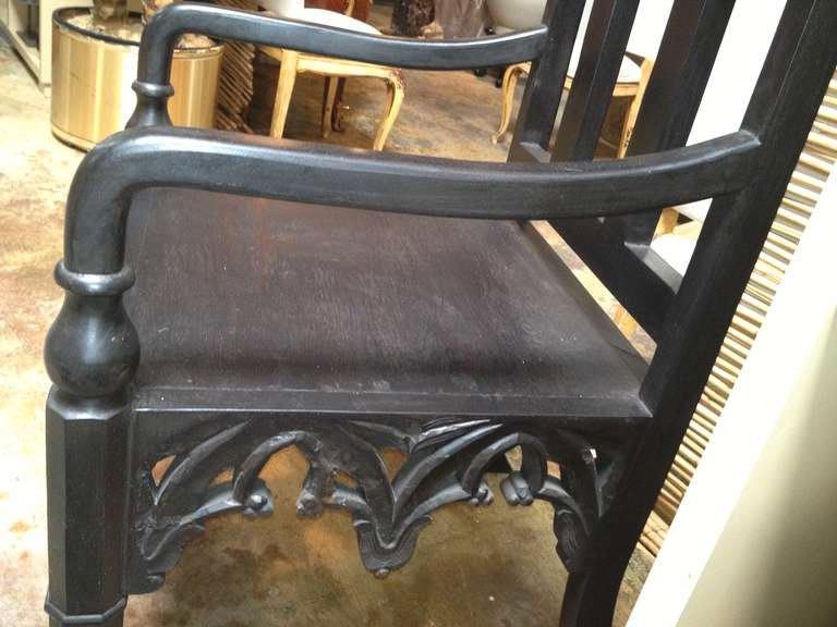 Beautiful Gothic chair with hand-carved Gothic details.
Accent any setting with this unique standalone chair
I would place this at a modern desk or as a conversation piece
in a seating arrangement.
The arm height is 25
