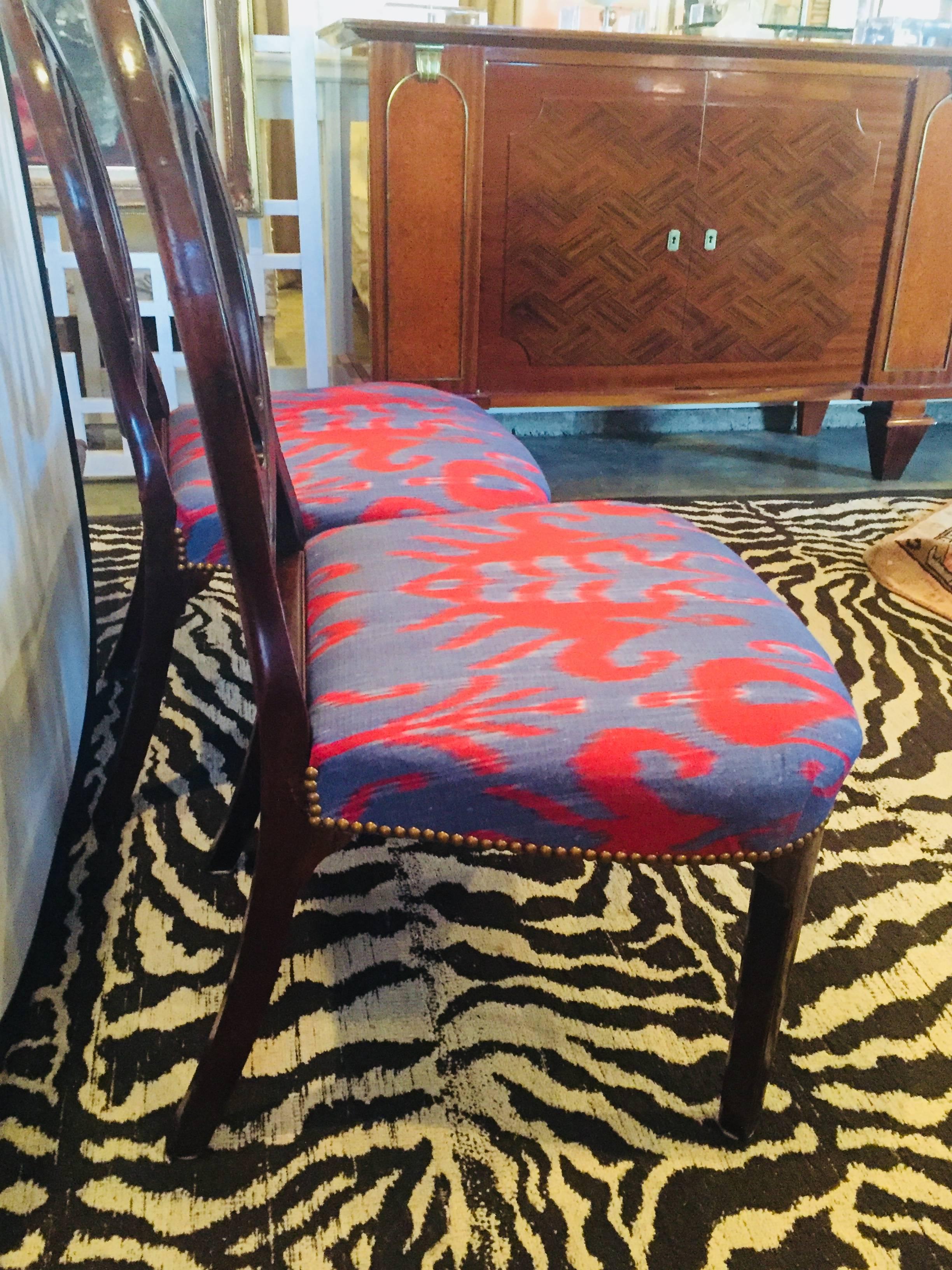 Antique pair of Hepplewhite side chairs.
Upholstered in Michelle Nussbaumer fabric
Antique nail trim.
 