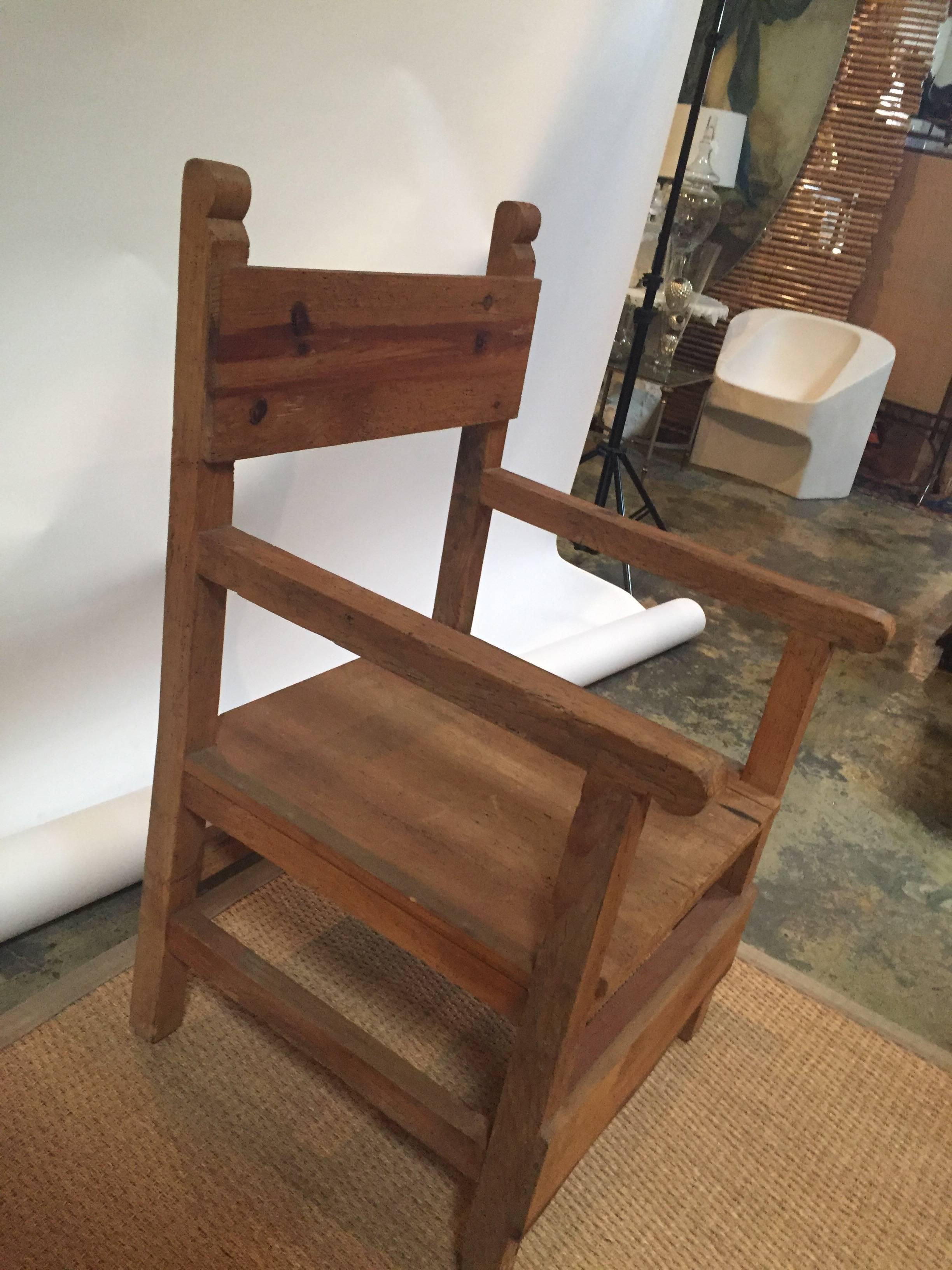 Pair of vintage Colonial-style Mexican hall chairs.