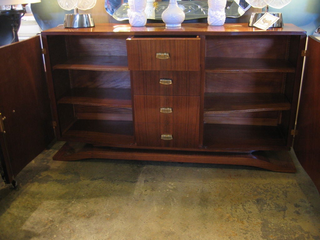 1940s French rosewood buffet with bronze mounts. Four drawers and two lockable side cabinets. Purchased at Sotheby's from the Vanderbilt Collection.