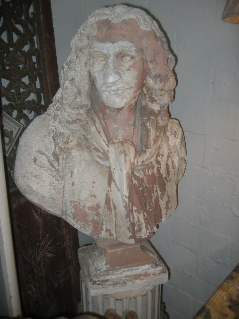 Beautifully aged plaster sculpture of a 17th century poet. Once painted a muted terra cotta color, weathering has created a wonderful, distressed patina.