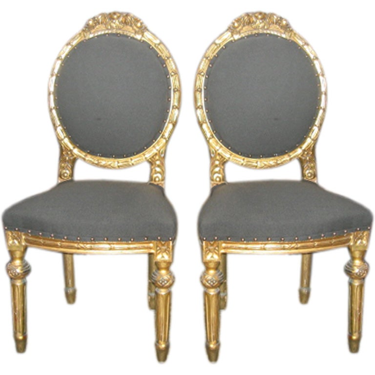Louis XVI Style Pair of Gilt Side Chairs in 24-Karat Gold Leaf