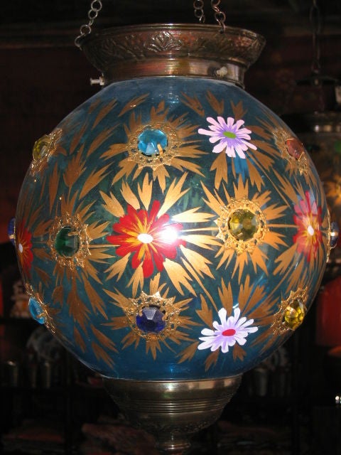 Hanging glass lantern in an assortment of colors