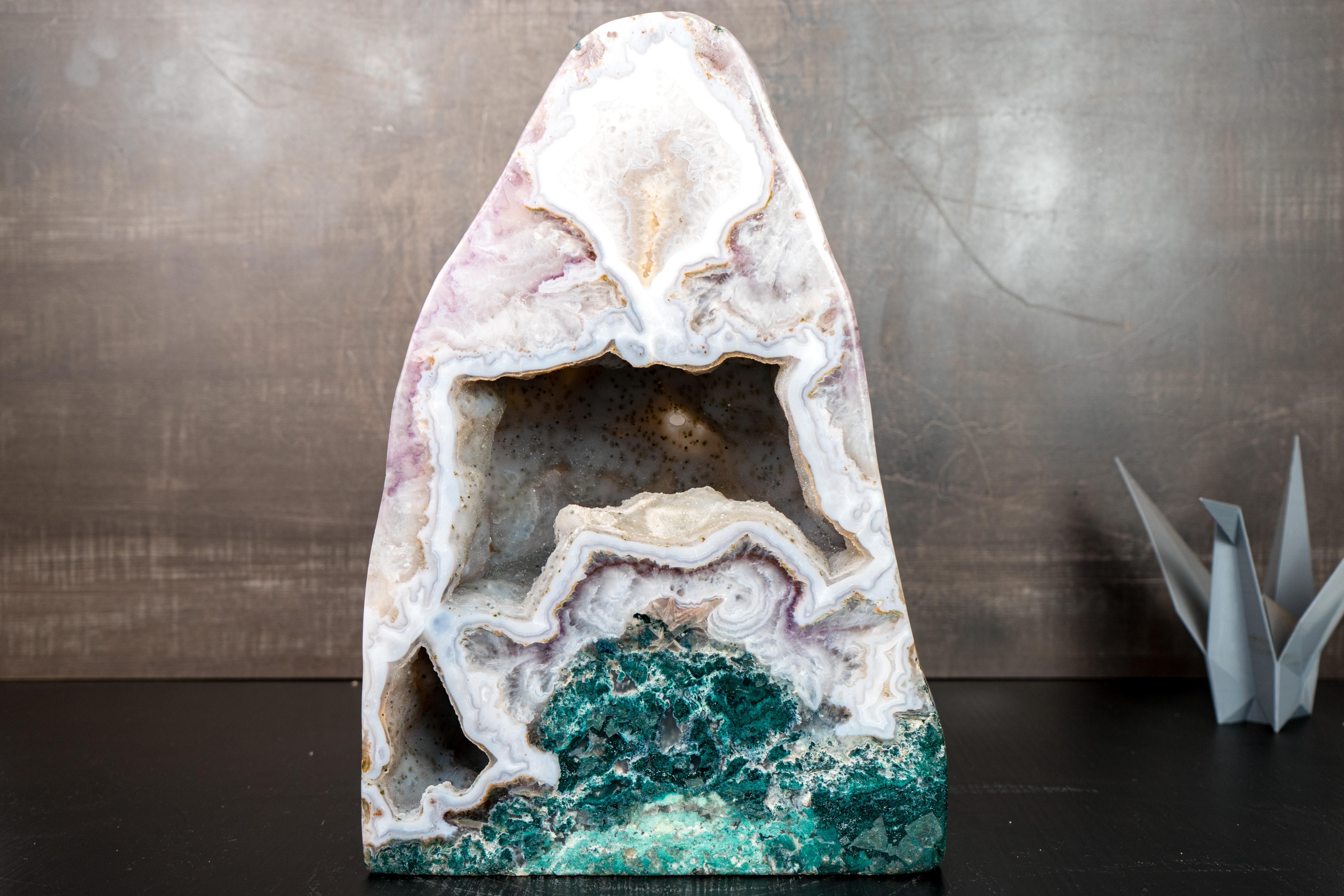 Rare Agate, Amethyst and Jasper Geode

If you're searching for a truly rare geode, this is the one. It showcases a unique combination of features seldom found together—including a cave lined with tiny micro druzy crystals and vibrant green