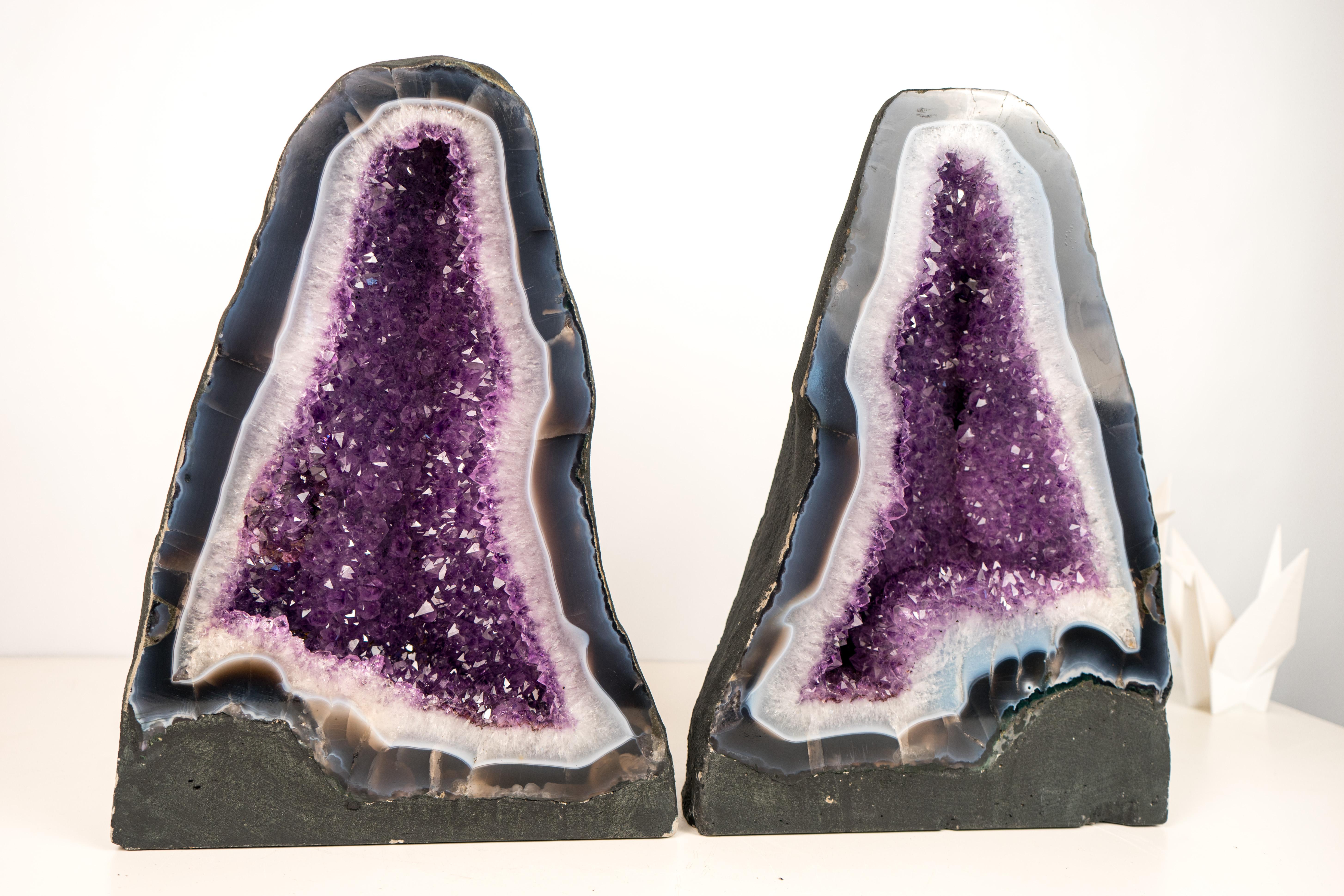 One of the Rarest Forms: Bookmatched White and Blue Lace Agate Geode Pair with Violet Amethyst

▫️ Description

All-natural and truly unique, this is a rarely seen pair of Blue and White Agate geodes, perfectly bookmatched so that the laces create a