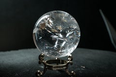 Water-Clear Quartz Sphere with Vivid Rainbows & Leaf-Shaped Feather Inclusions