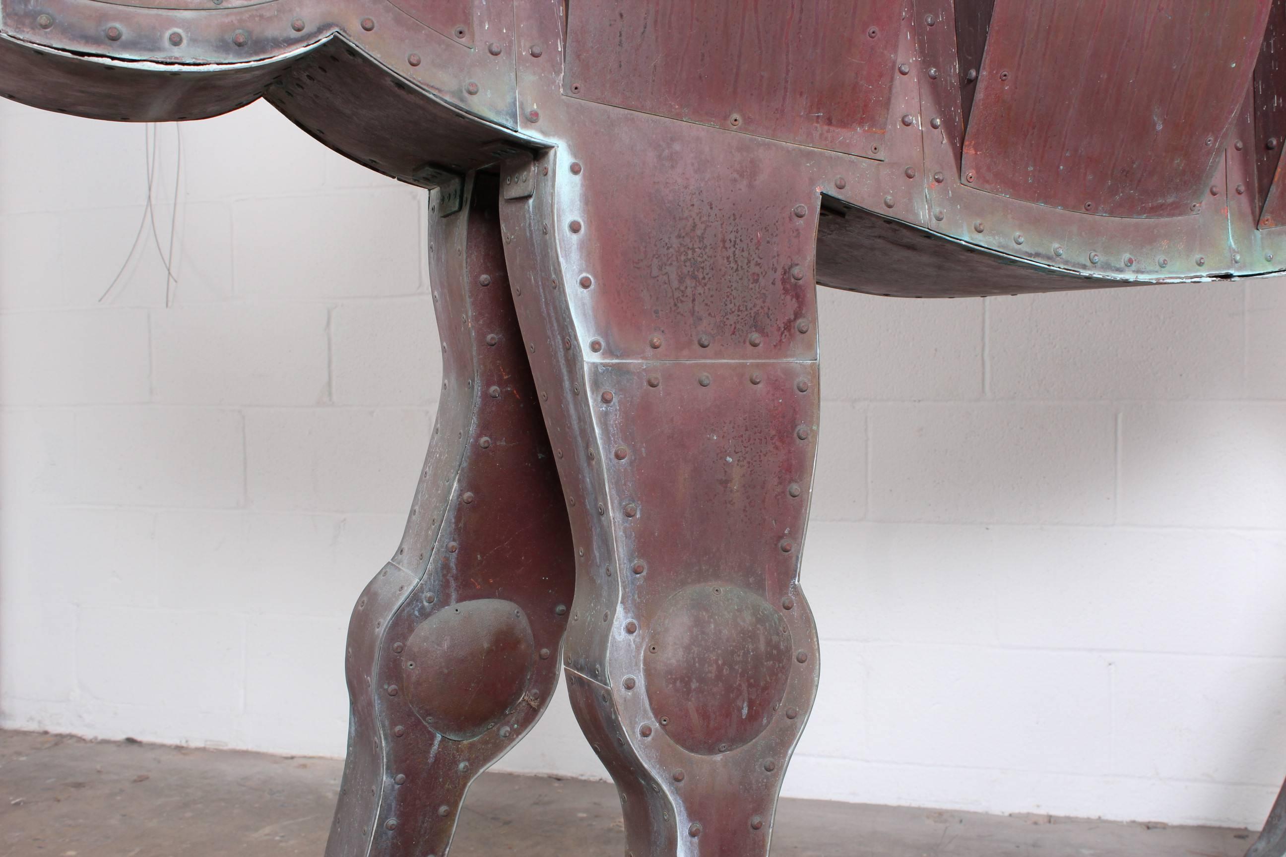 A lifesize patinated copper camel sculpture by Ken Kalman, 2006.