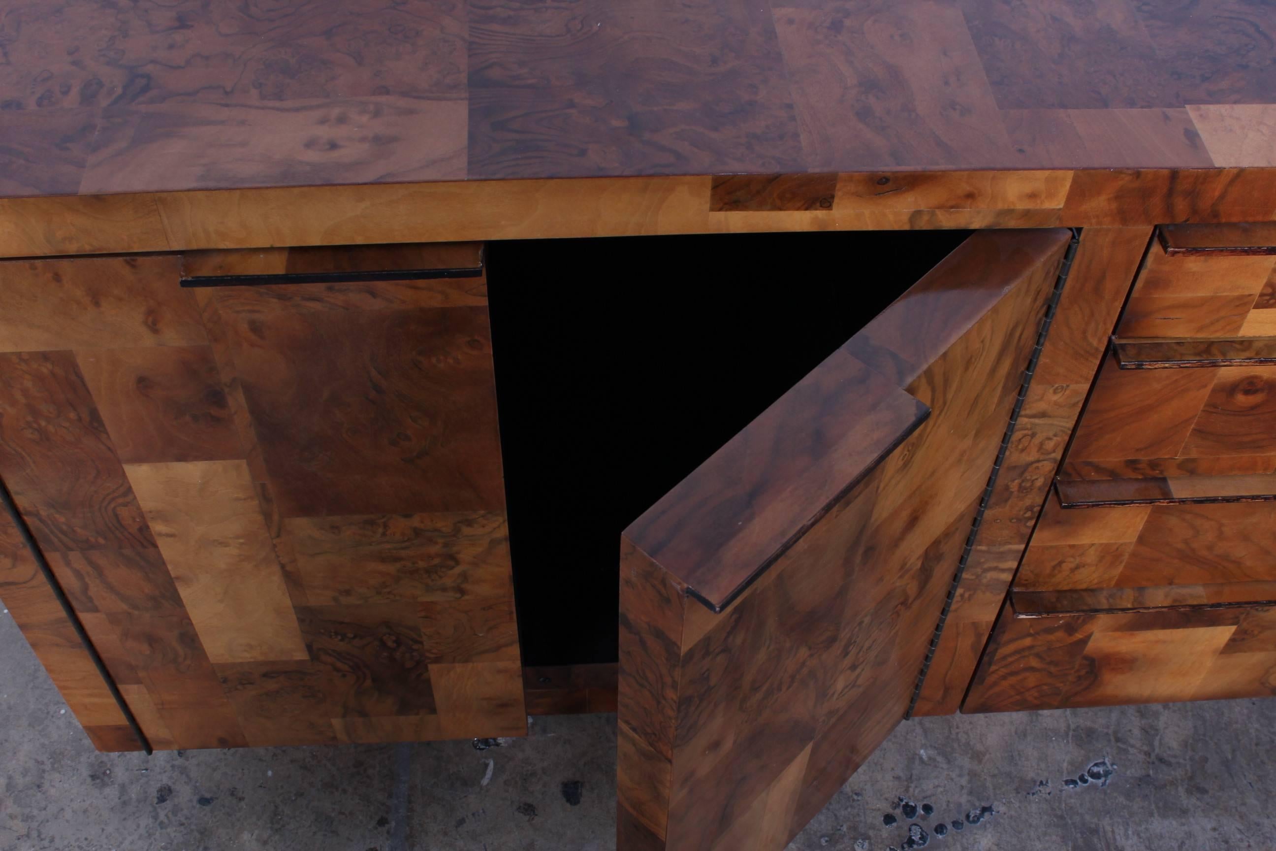A large-scale Cityscape cabinet in all burl veneer patchwork. Designed by Paul Evans for Directional.
