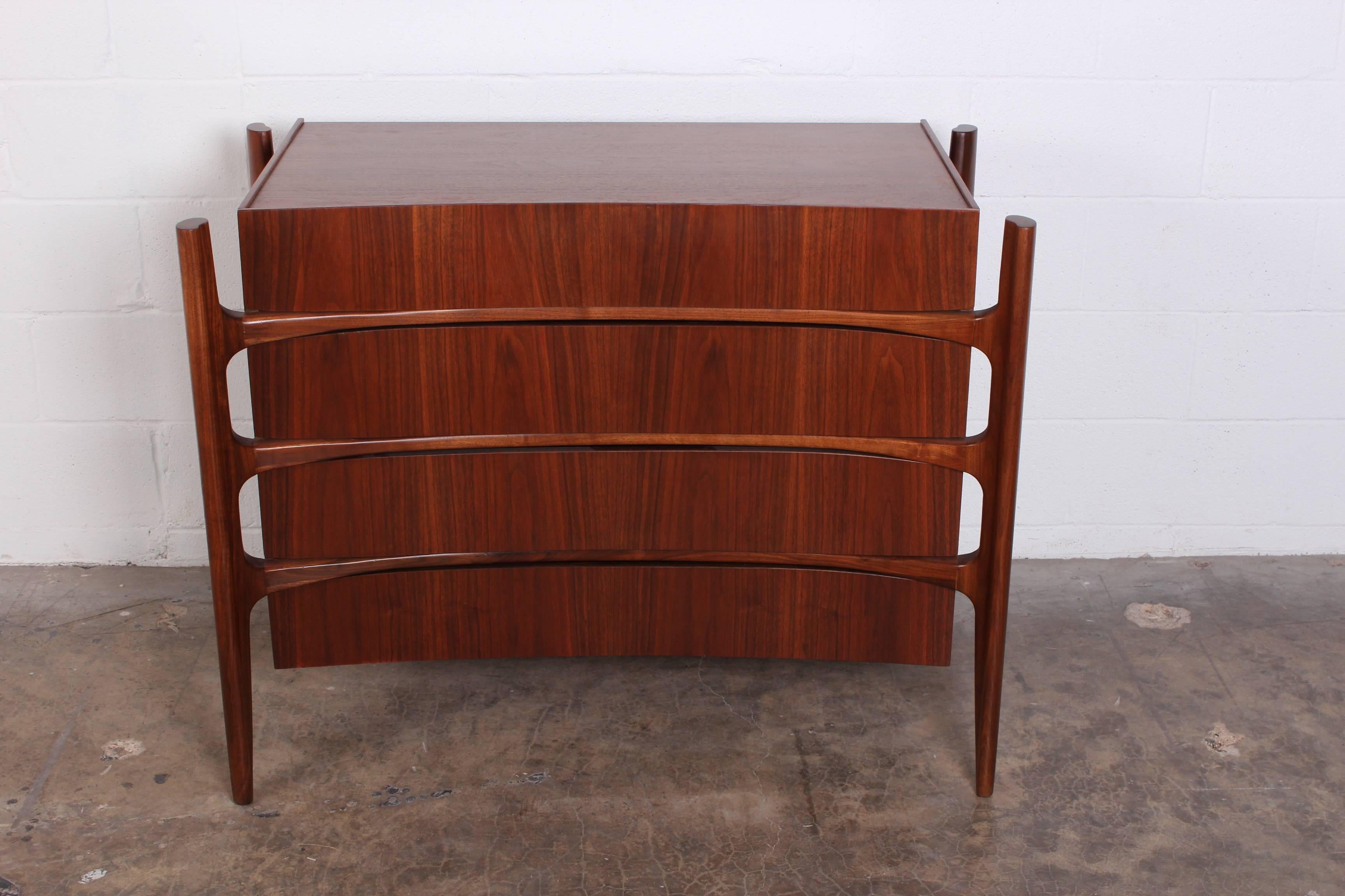 A sculptural walnut four-drawer dresser designed by William Hinn and 
made in Sweden by the Swedish furniture guild for Urban Furniture.