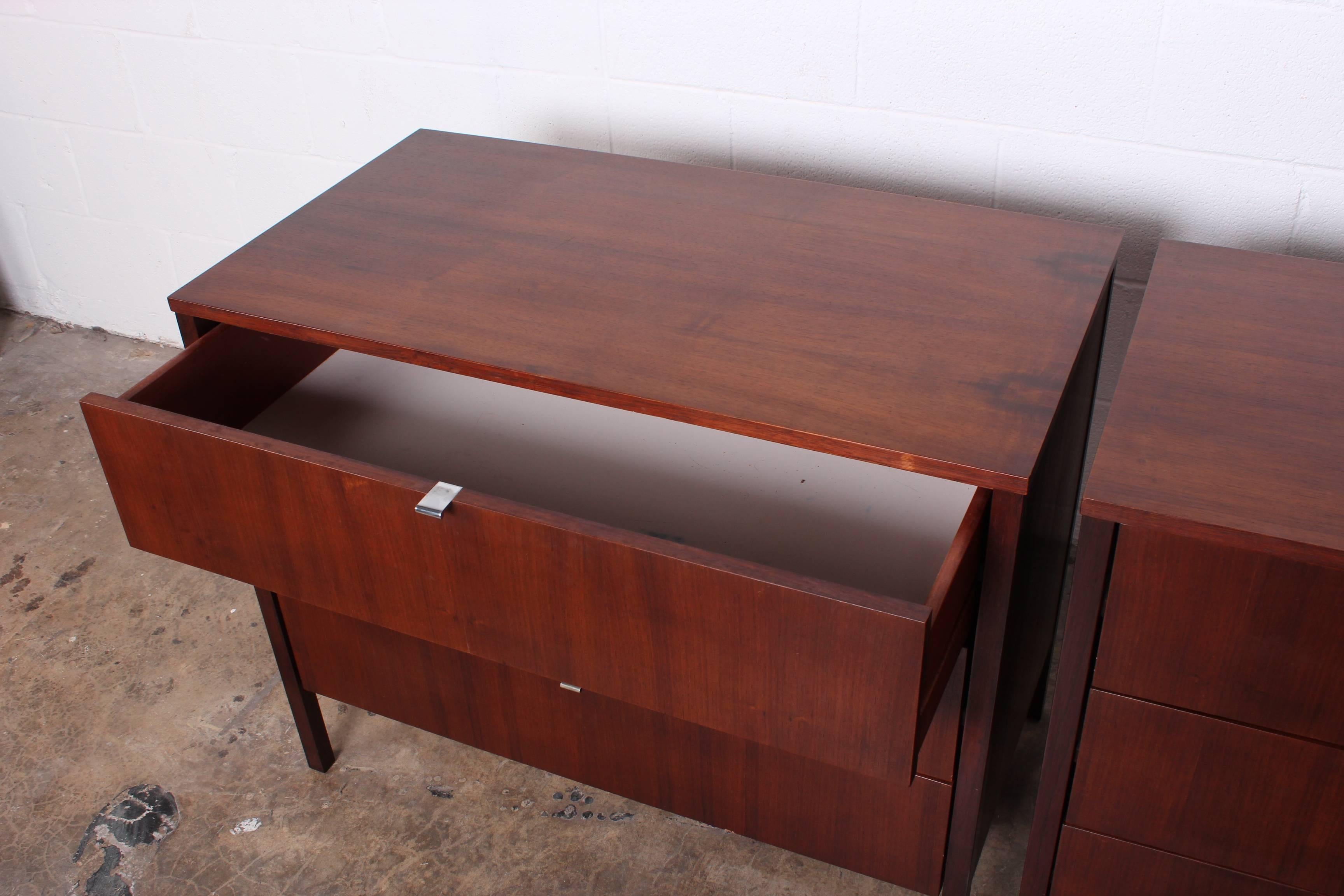 A pair of early rosewood dressers designed by Florence Knoll for Knoll.