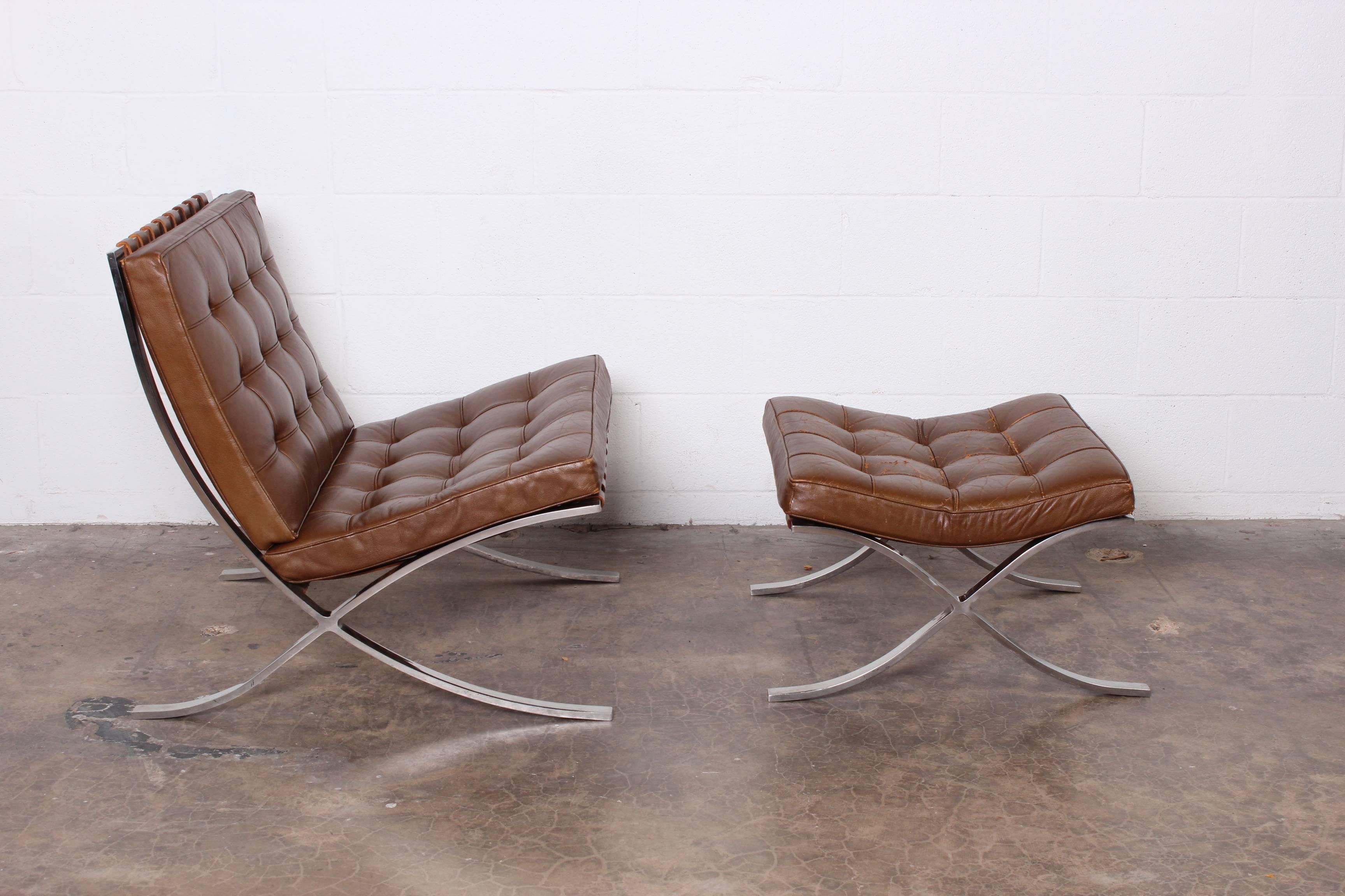 A nicely patinated Barcelona chair and ottoman designed by Mies van der Rohe for Knoll.