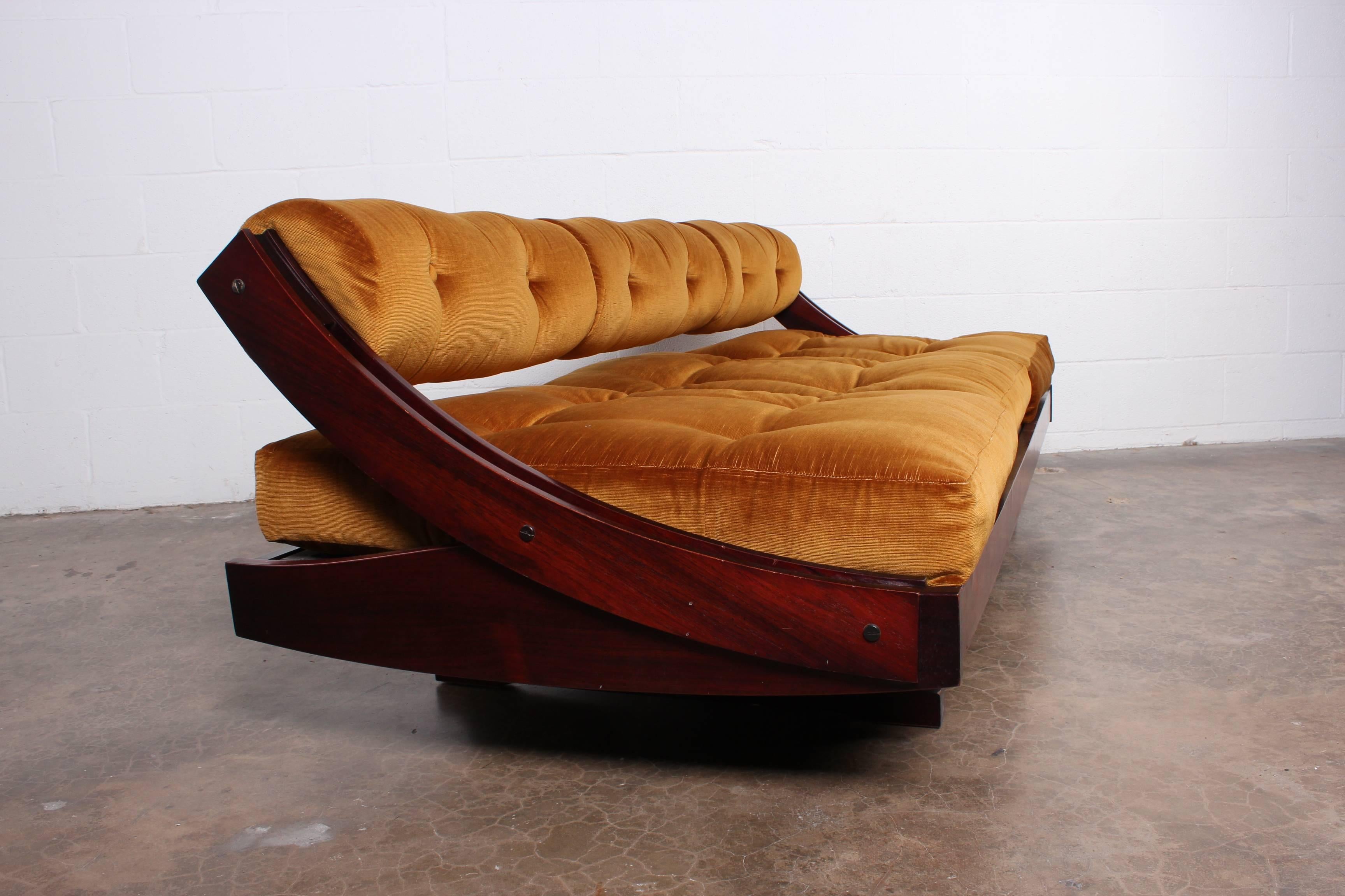 A pair of rosewood daybeds with adjustable backs. Designed by Gianni Sormani for Sormani, 1963. Priced and sold separately.