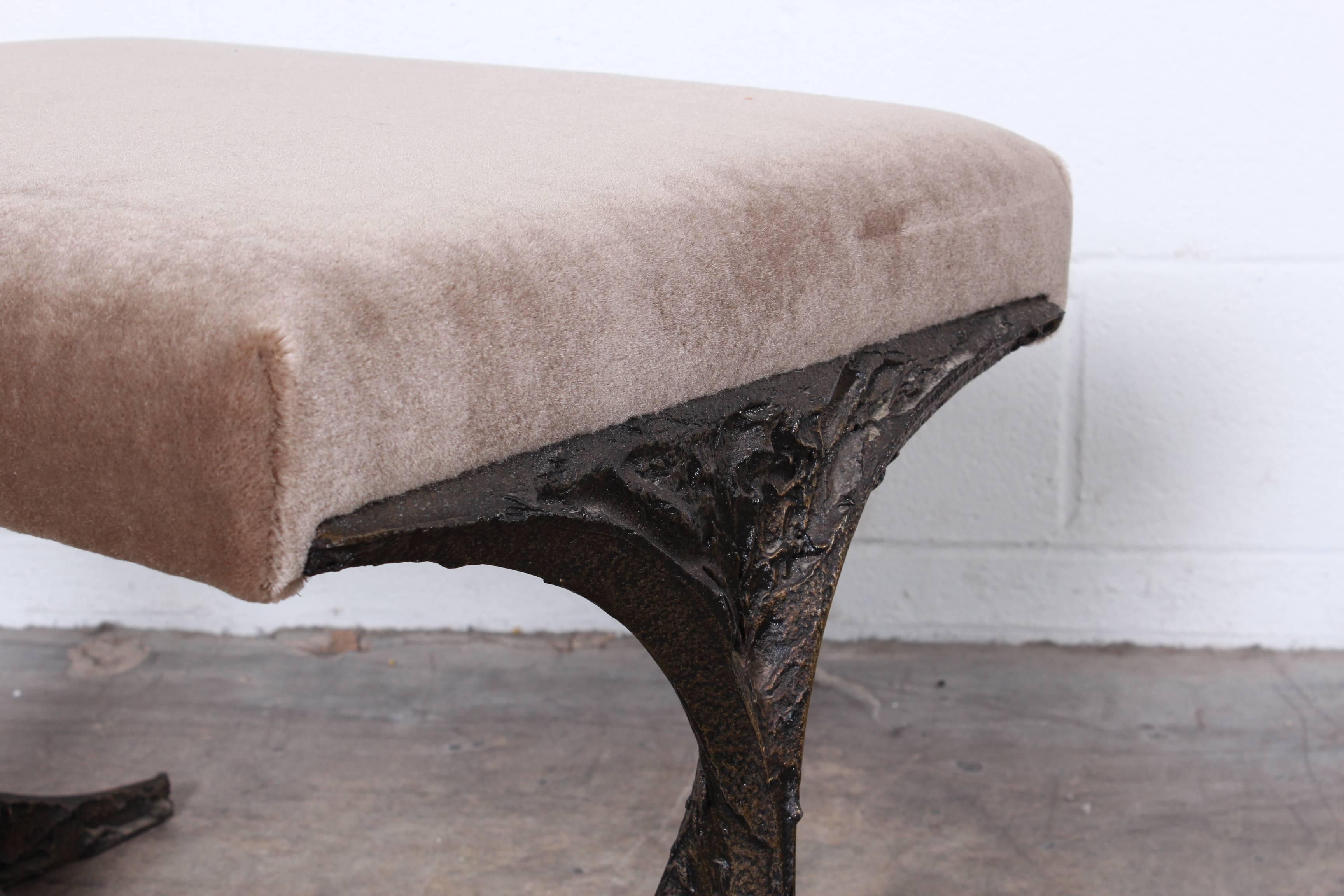 A sculpted bronze stool designed by Paul Evans in mohair.