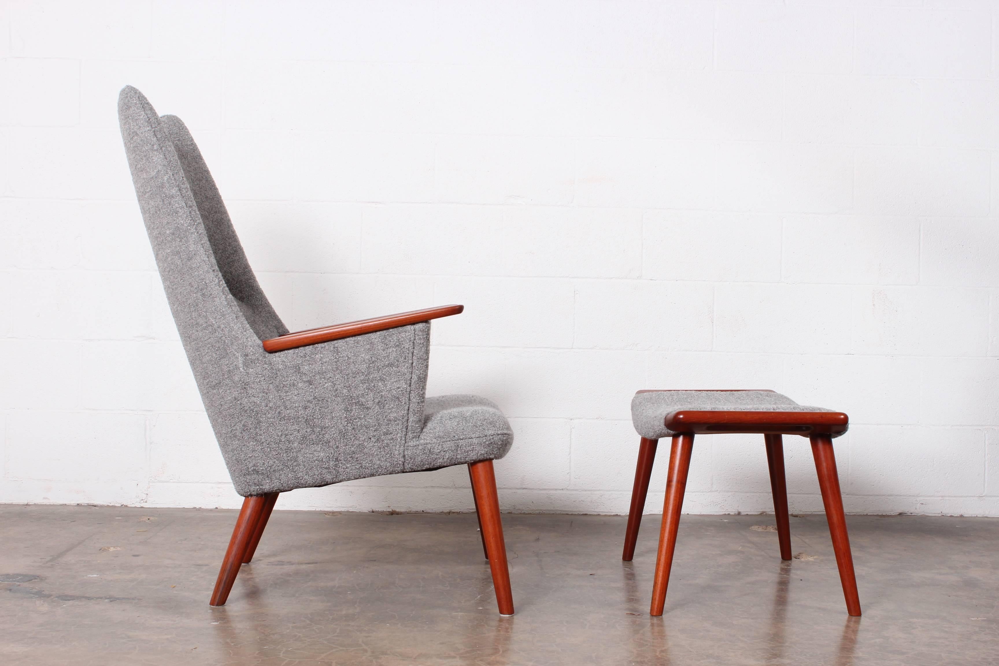 AP-27 lounge chair and ottoman in teak. Designed by Hans Wegner for A.P. Stolen.