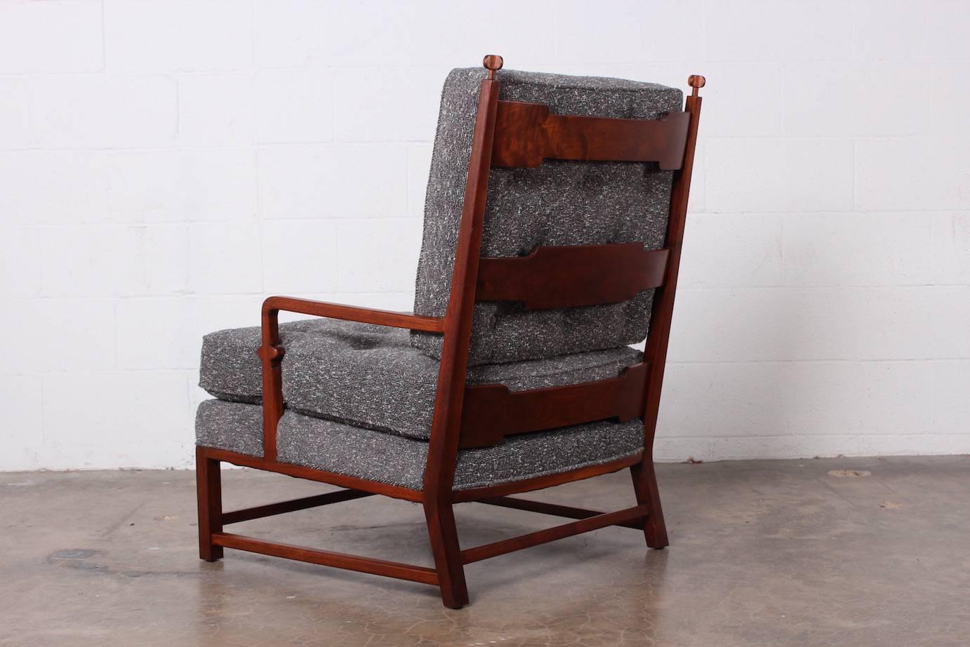 A rare mahogany throne chair designed by Tommi Parzinger for Parzinger originals.