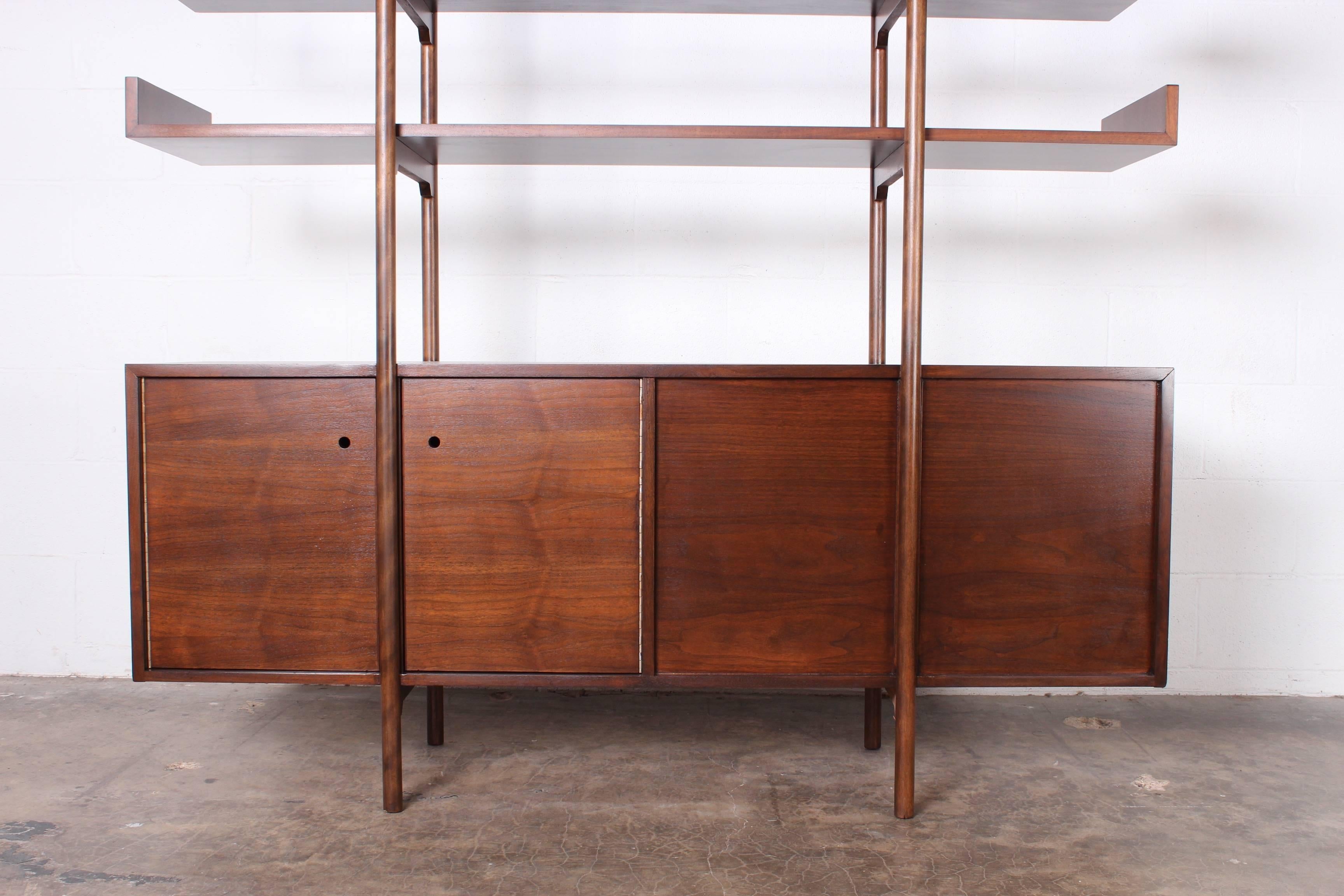  A rare and early double sided room divider designed by Milo Baughman for Glenn of California. freestanding with operable doors on both sides. .