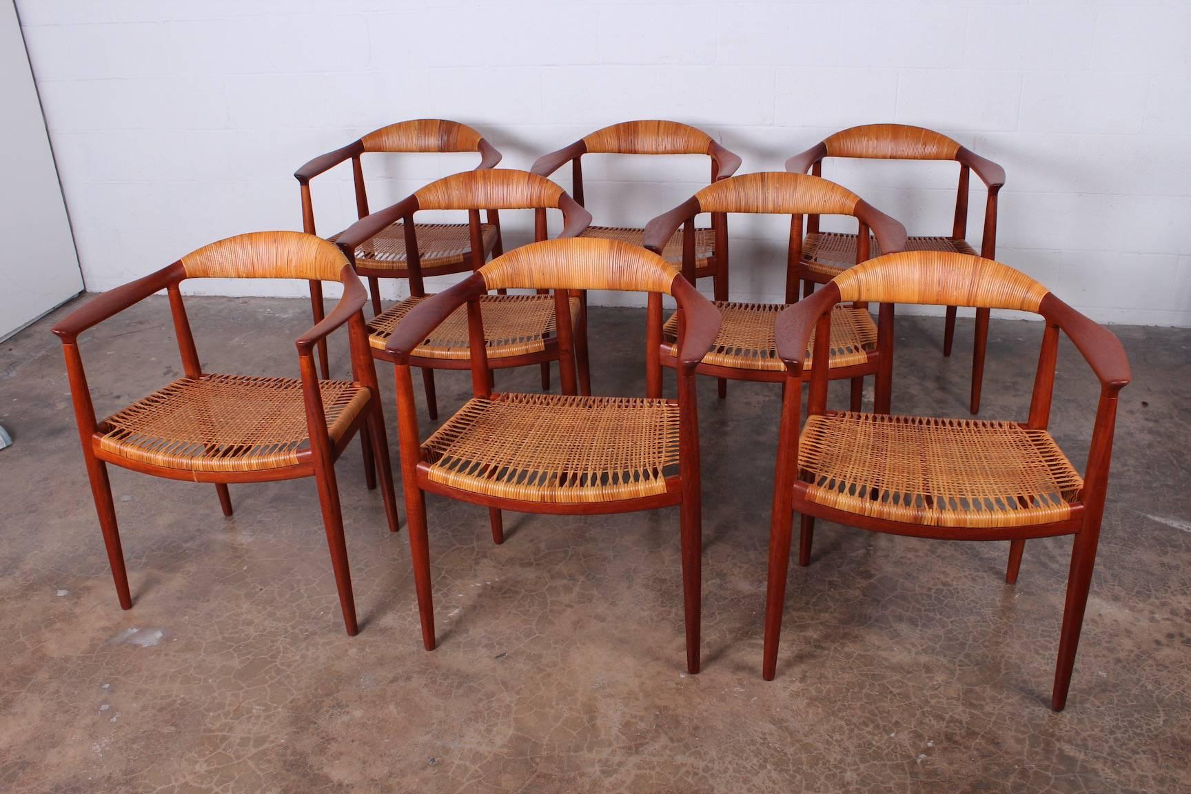 A set of eight solid teak 