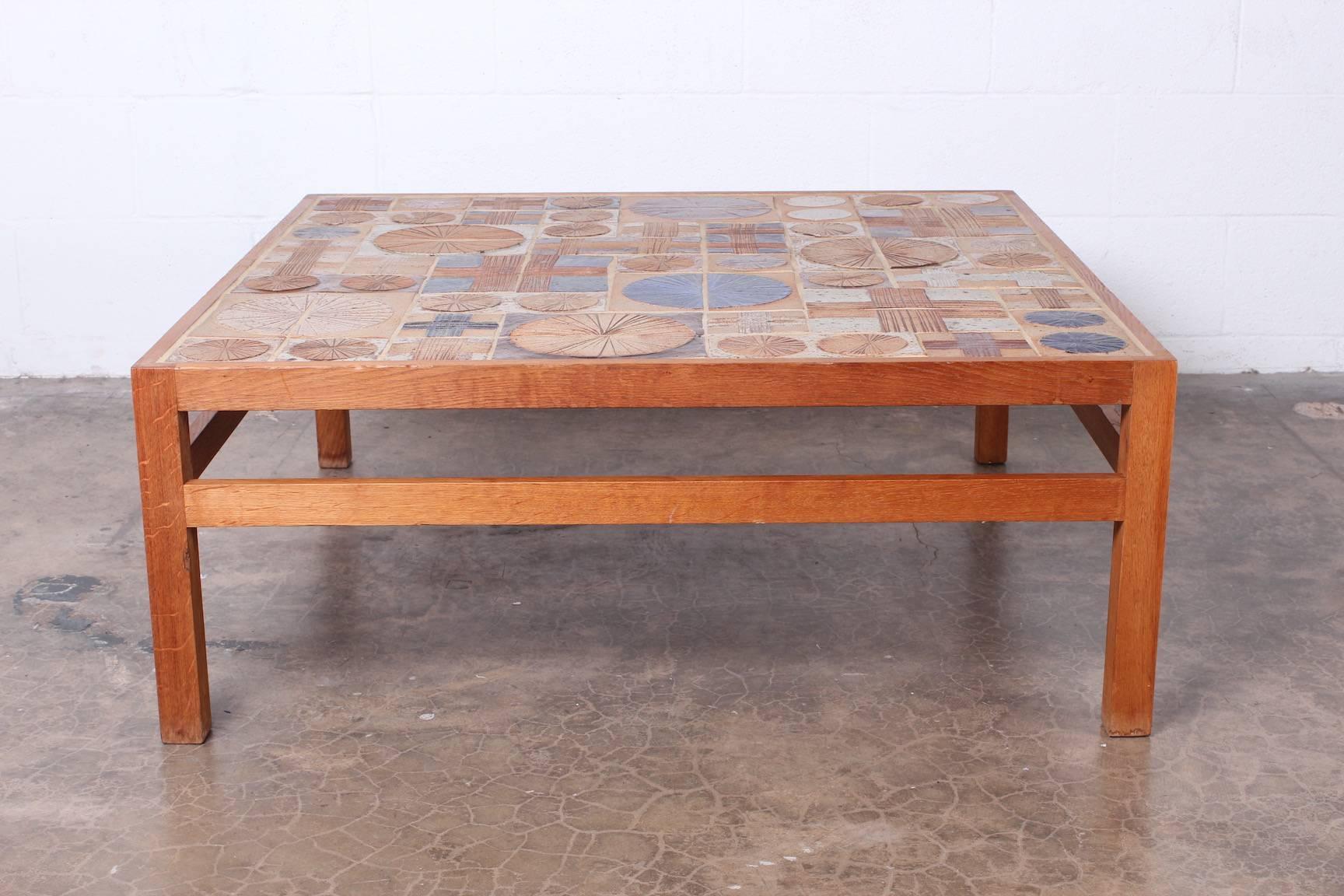 Teak coffee table with inset ceramic tiles by Tue Poulsen & Willy Beck.